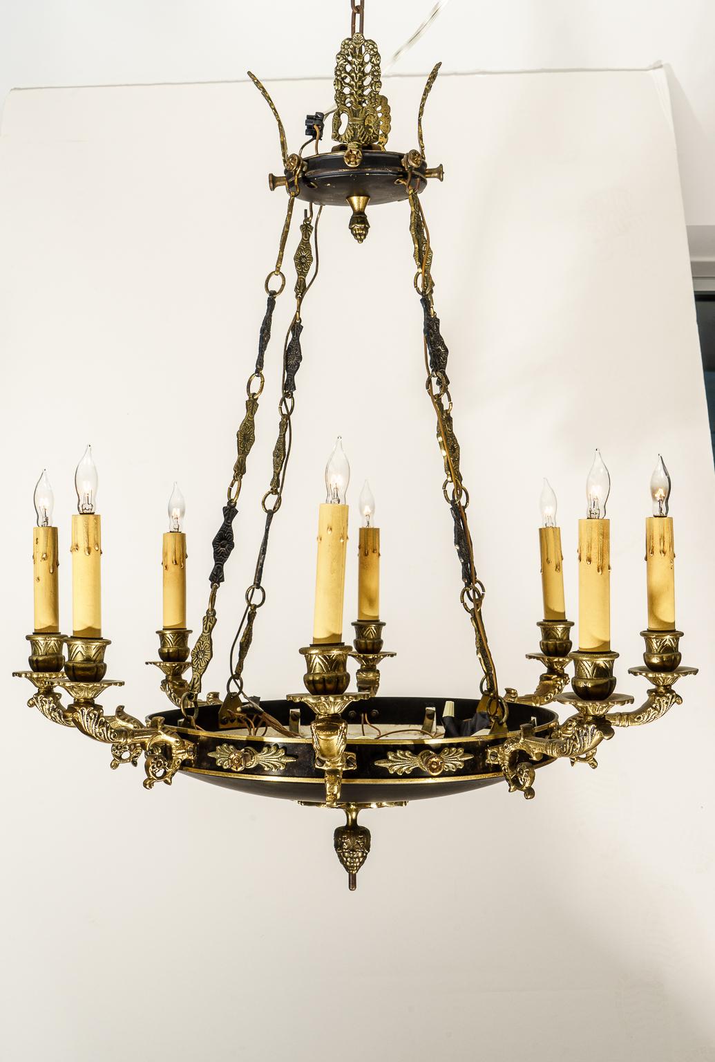 This sylish French Empire revival style chandelier was acquired from a Palm Beach estate.

Note: Height of the chandelier not including the chain is 28.50