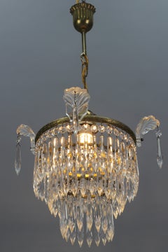 French Empire Style Crystal Glass and Brass Three-Tired Chandelier, 1930s