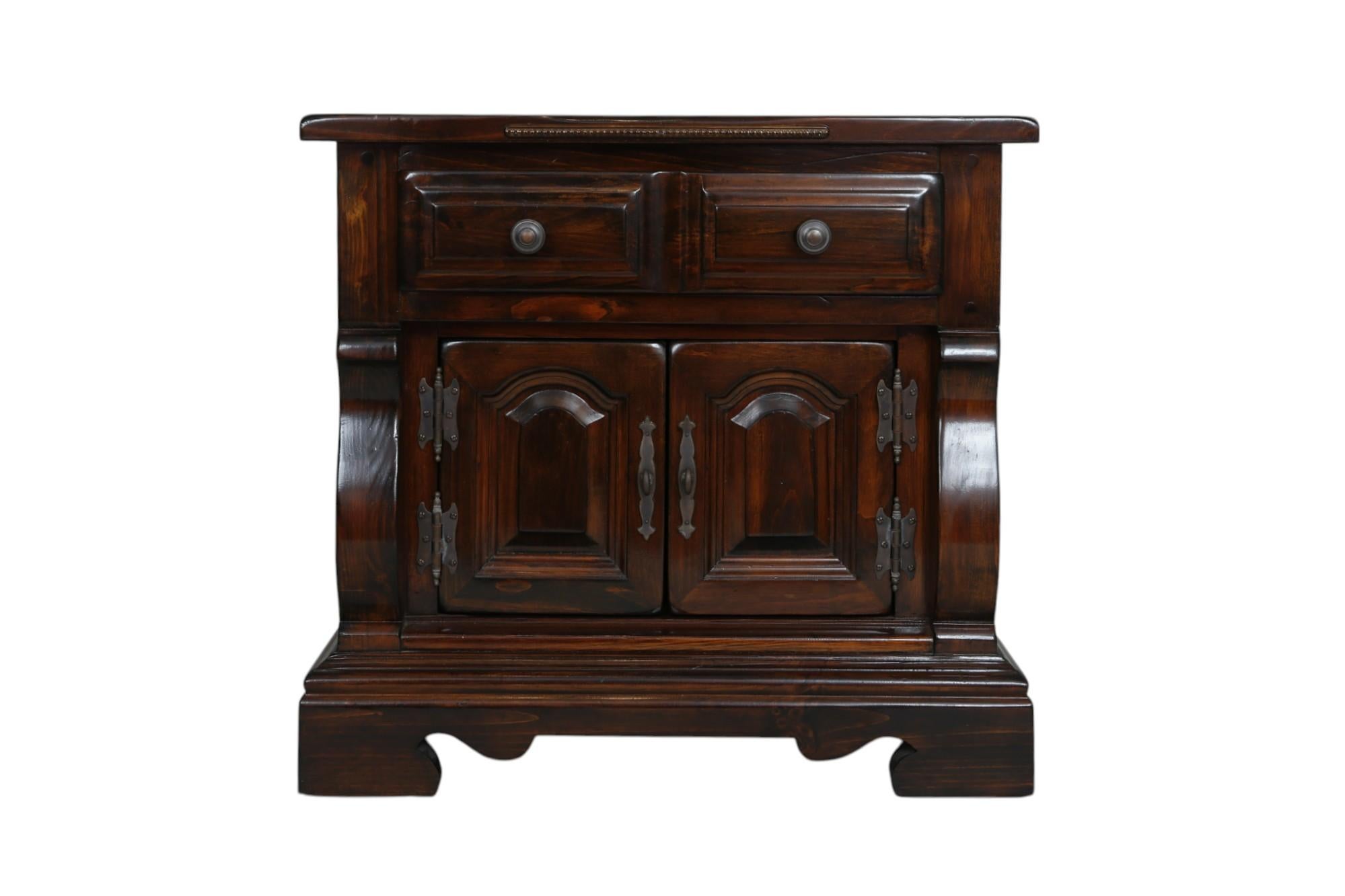A French Empire style custom made cabinet, hand made by Lion Crest Woodworking of Sarasota, FL. The cabinet top has rounded edges with a decorative beaded section in front. A single drawer has the look of two with round mushroom knob handles at the