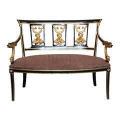 Settee de style Empire français en bois doré ébénisé sculpté de dauphins, vers 1950