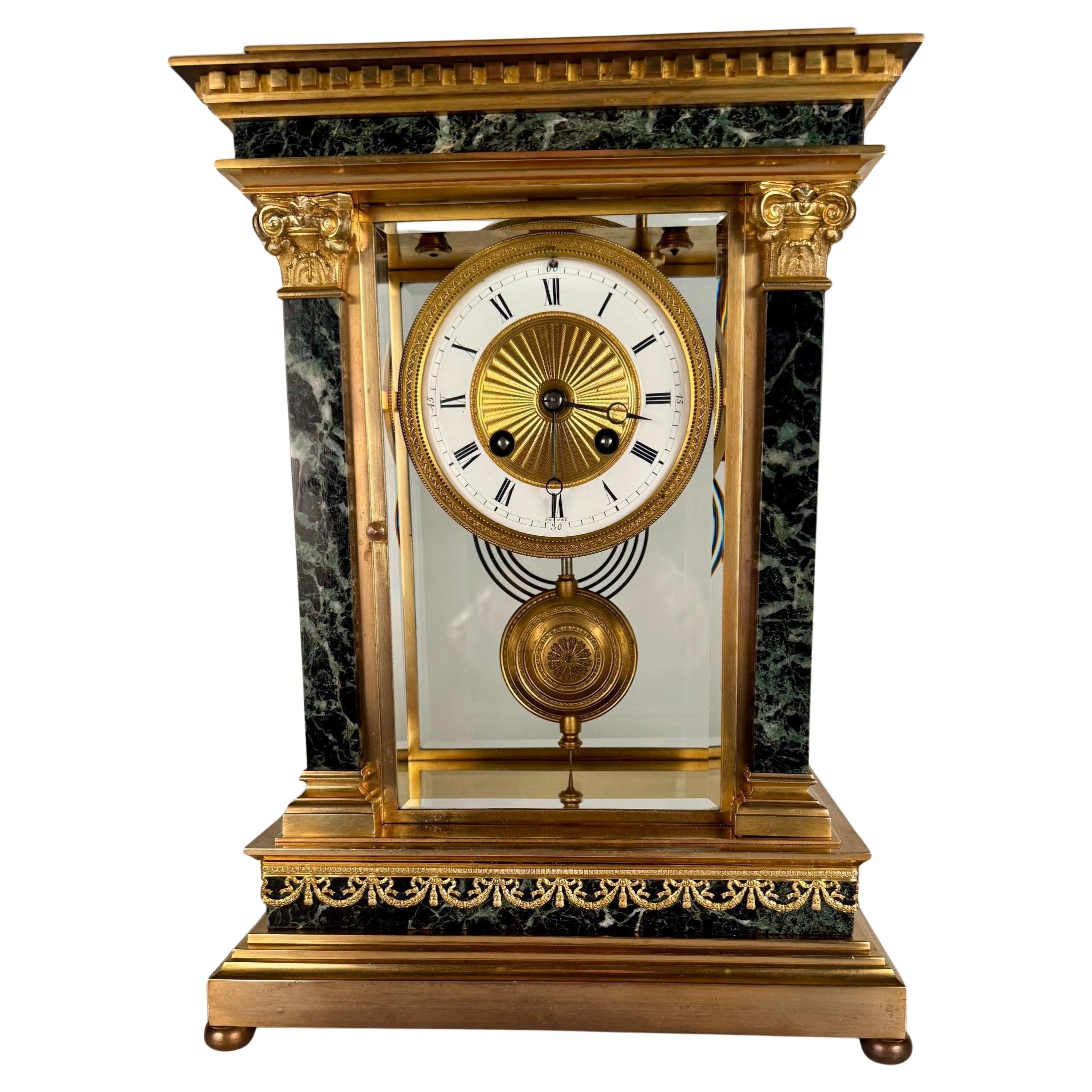 French Empire Style Gilt bronze and Green Marble Mantel Clock