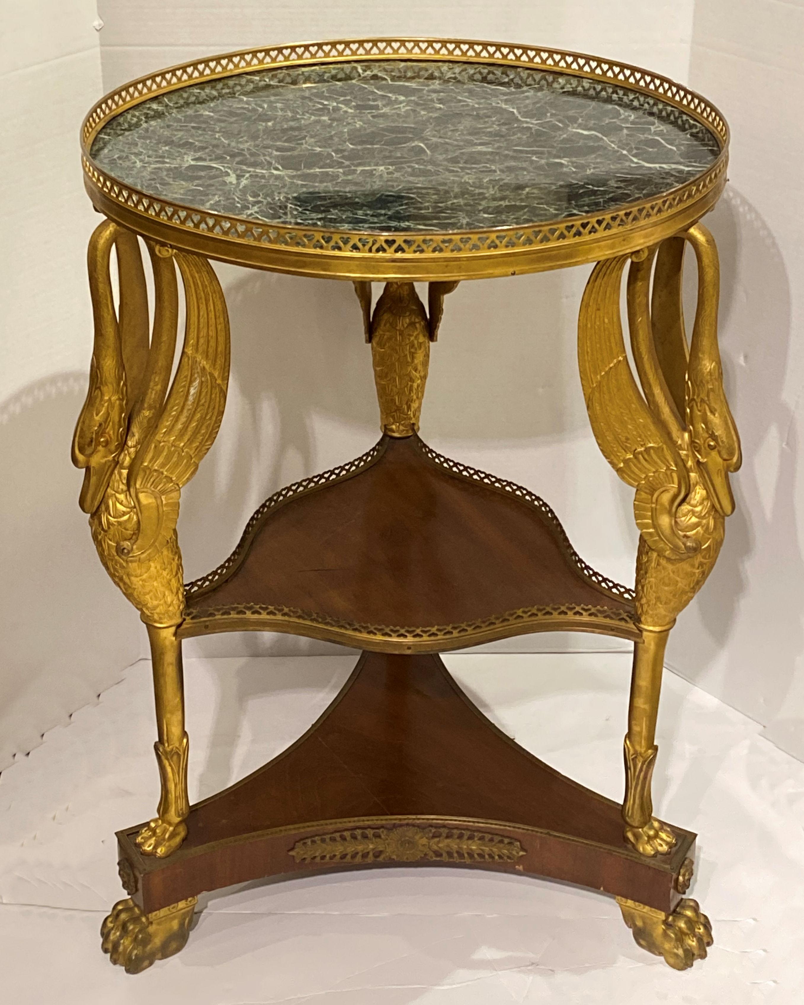 19 century French Empire Style gilt bronze and mahogany marble-top gueridon table with bronze swan legs.