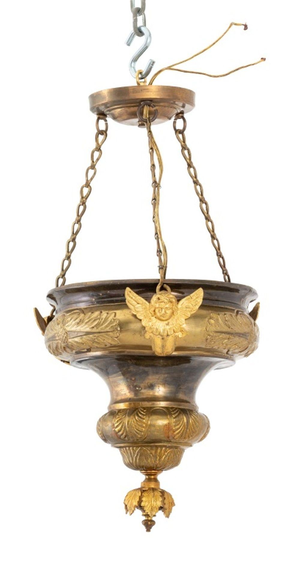 French Empire Style Gilt Metal Chandelier, with applied putti busts and molded acanthus leaf motif. 21