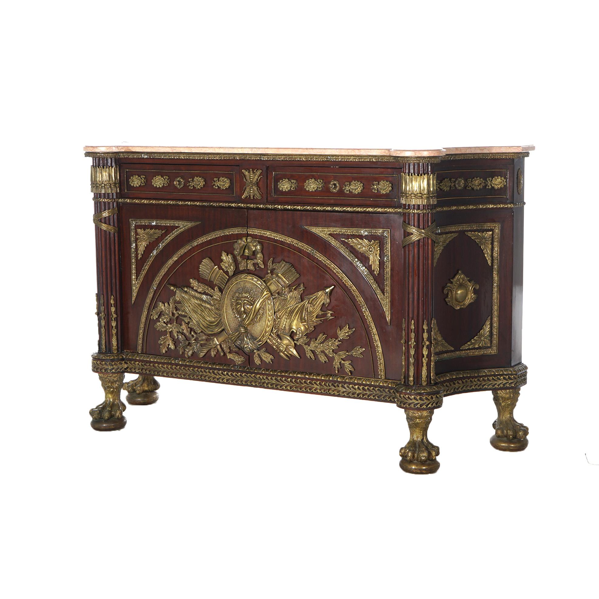 A French Empire style sideboard offers shaped and beveled marble top surmounting kingwood case having two drawers over double door lower cabinet, foliate cast ormolu mounts throughout, raised on oversized paw feet, 20th century

Measures - 38.5