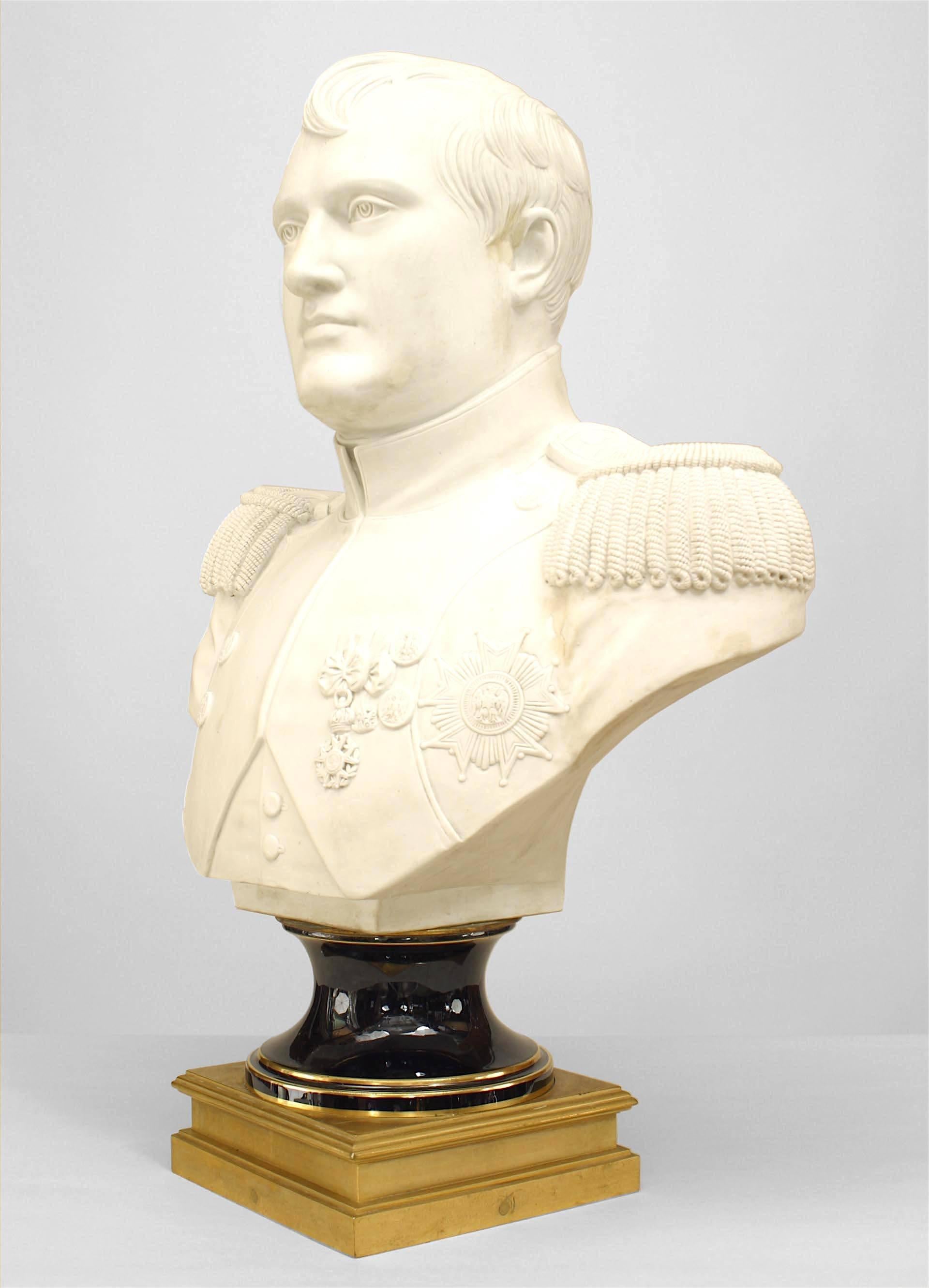 French Empire style (late 19th Century) life size Parian bust of Napoleon on blue porcelain socle and square ormolu base (signed HOUDON, 1805)
