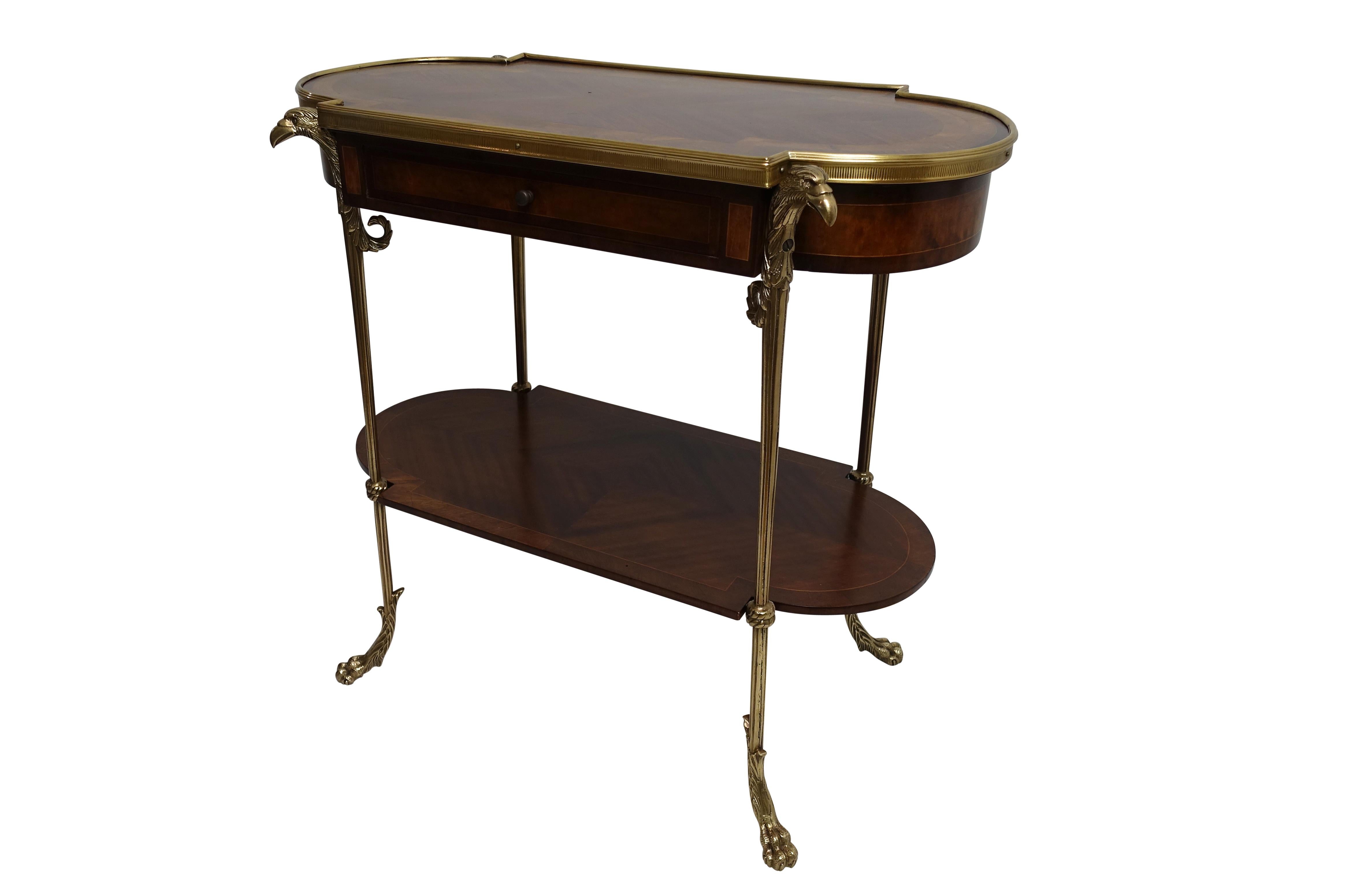 Unusual Empire Revival style mahogany and walnut side table with inlay detail and brass mounts. In excellent restored condition, France, late 19th-early 20th century.