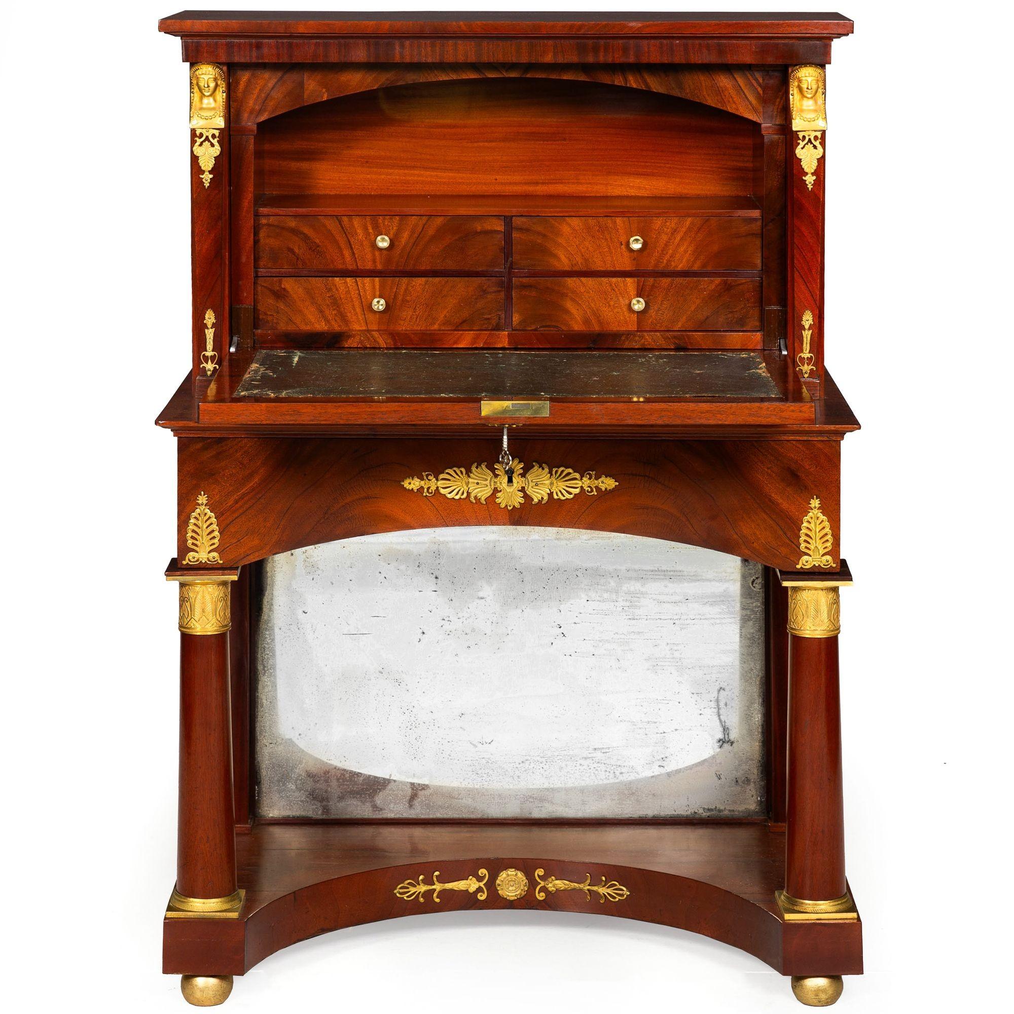 EMPIRE STYLE GILT-BRONZE MOUNTED MAHOGANY SECRETARY DESK

Composed of 19th century elements

ref. 501GWU22P

45 7/8
