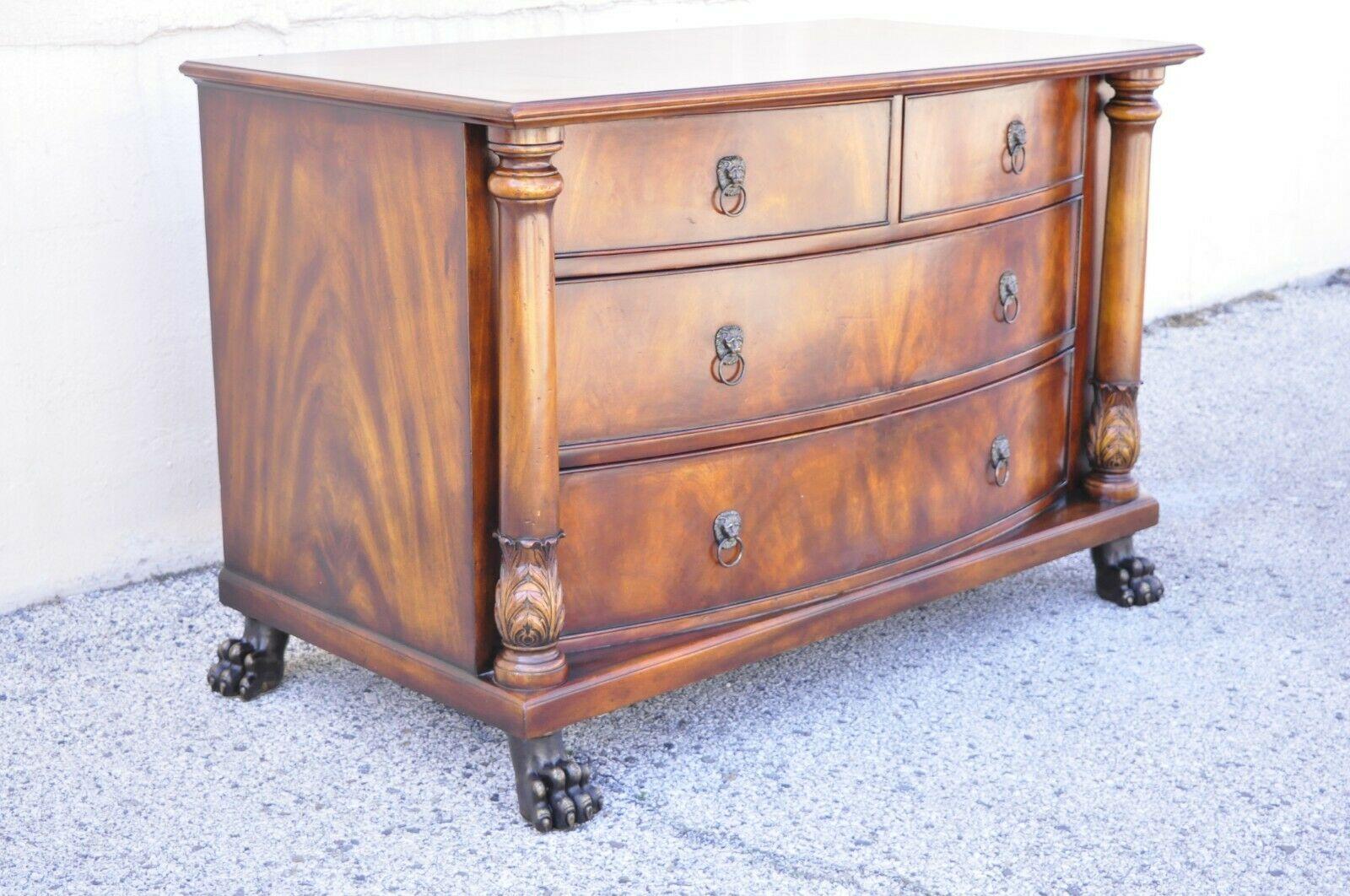 French Empire style mahogany bow front chest dresser with bronze paw feet. Item features cast bronze metal paw feet, bowed front, lion head pulls, solid wood construction, beautiful wood grain, nicely carved details, 4 drawers, very nice item,