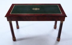 French Empire style mahogany bronze mounted leather top writing desk. C 1940.