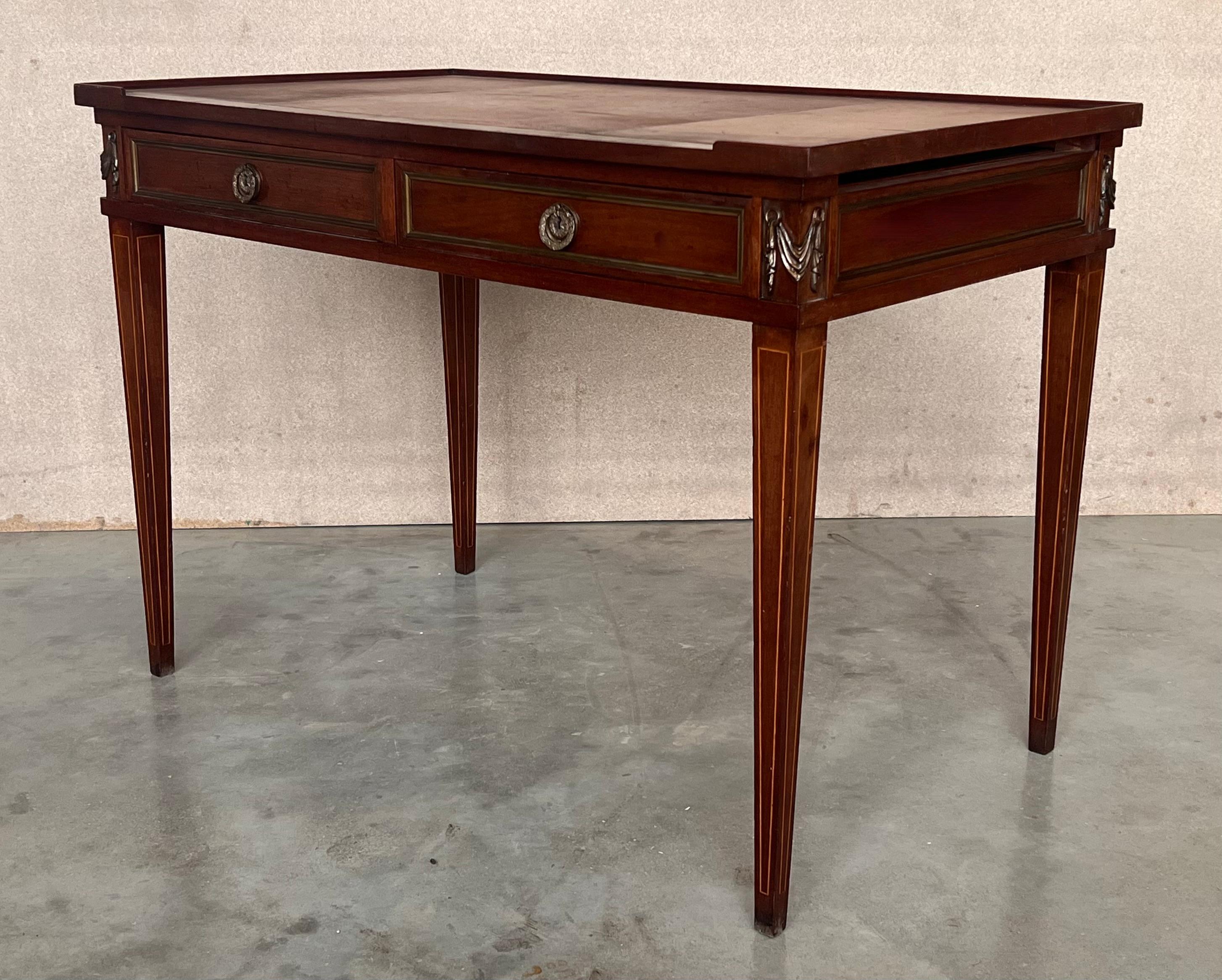 20th Century French Empire style mahogany bronze mounted writing desk, leather top circa 1940 For Sale