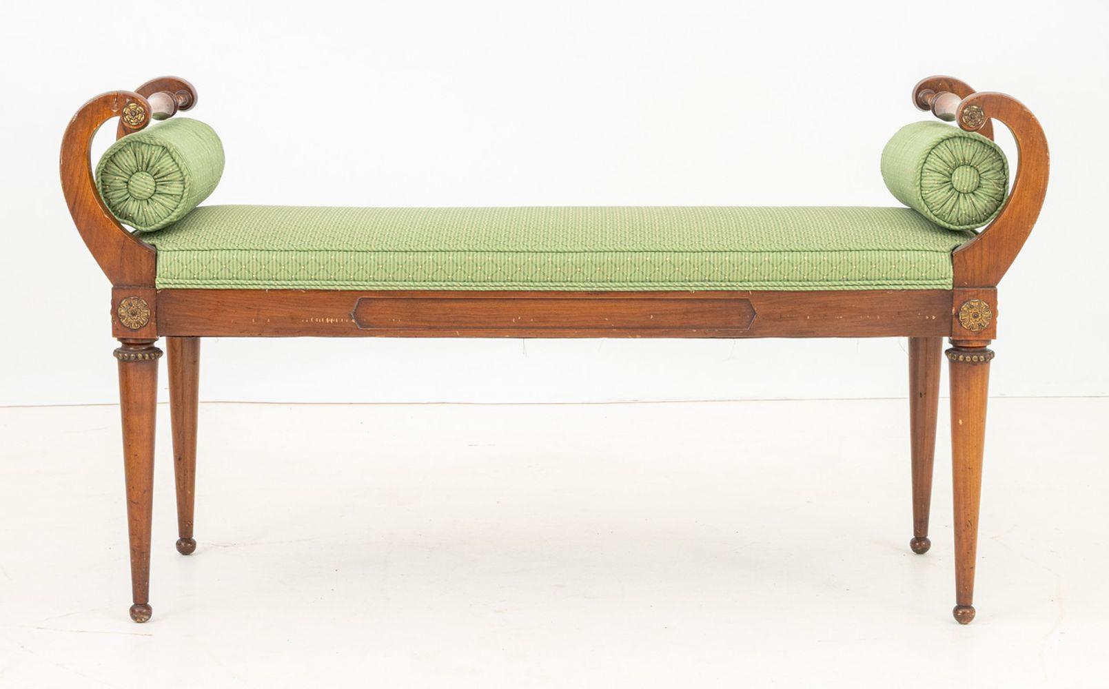 French Empire Style Mahogany Curved Window Seat, with rolled arms, green upholstered seat with two cylindrical pillows on four tapered legs. 24.5