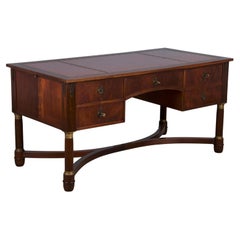 Bureau en acajou de style Empire avec plateau en cuir rouge