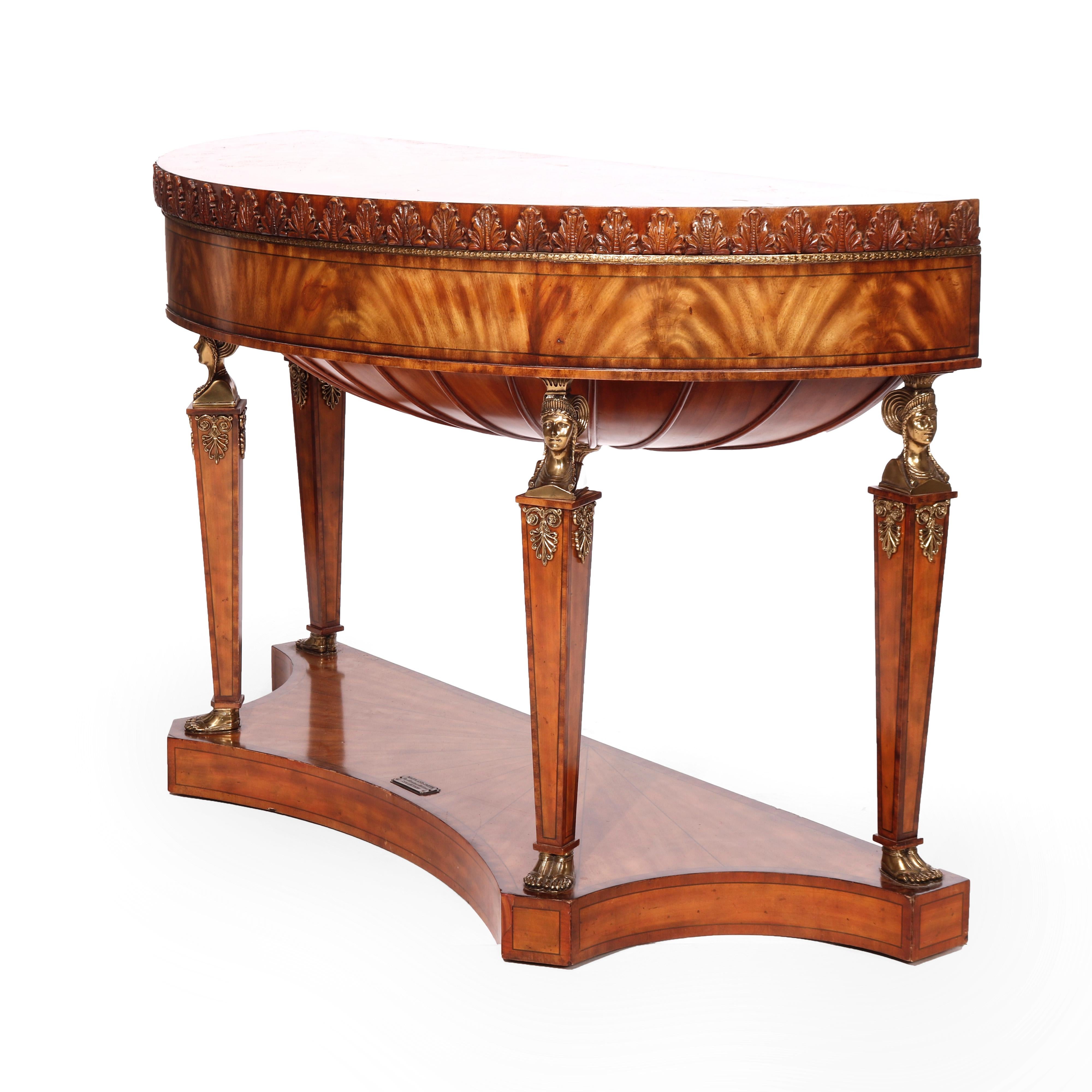 A French Empire style console table by Maitland Smith of the 