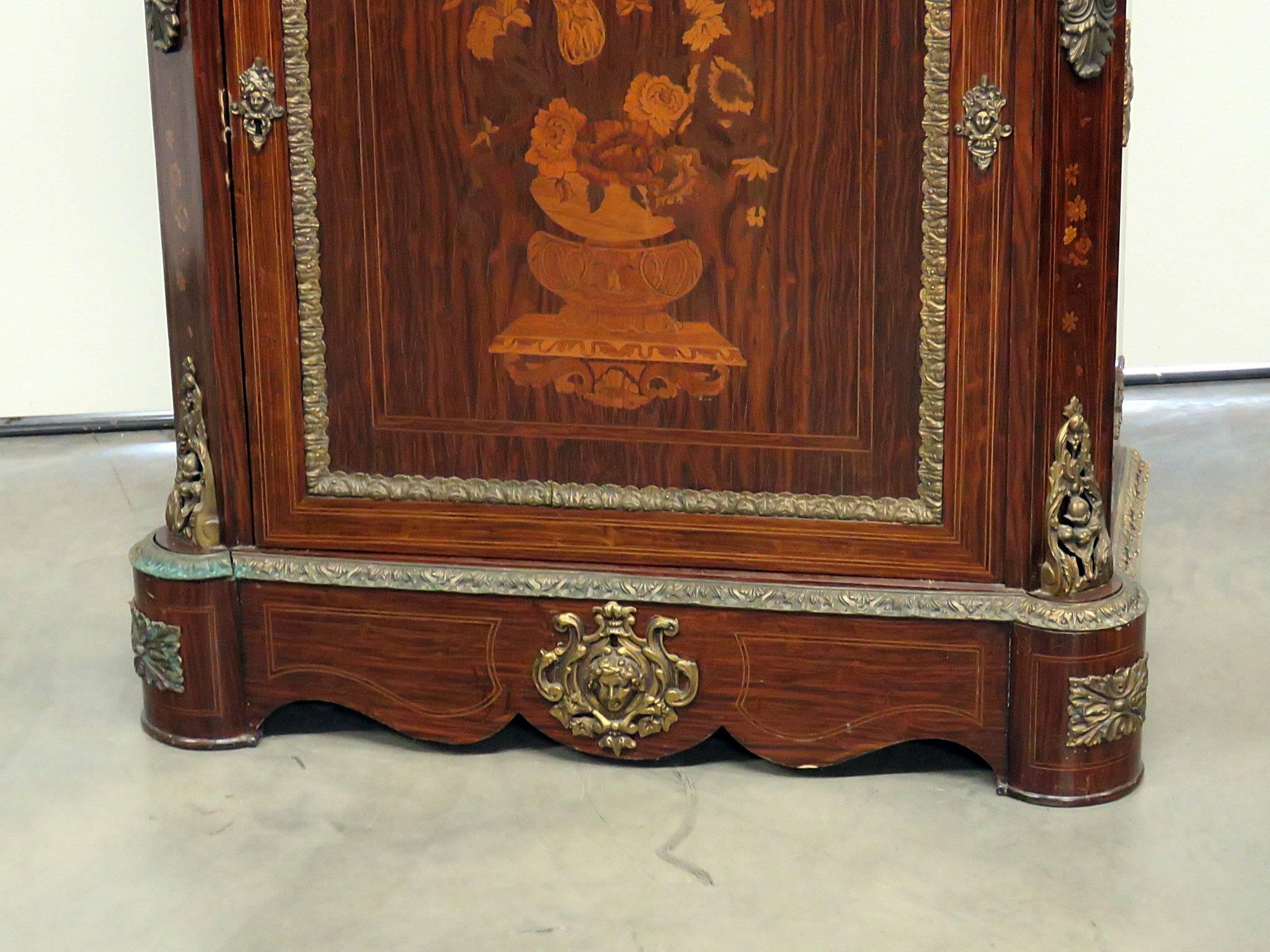 French Empire style marble top cabinet with one drawer over one door with one shelf. Detailed inlay with bronze accents.