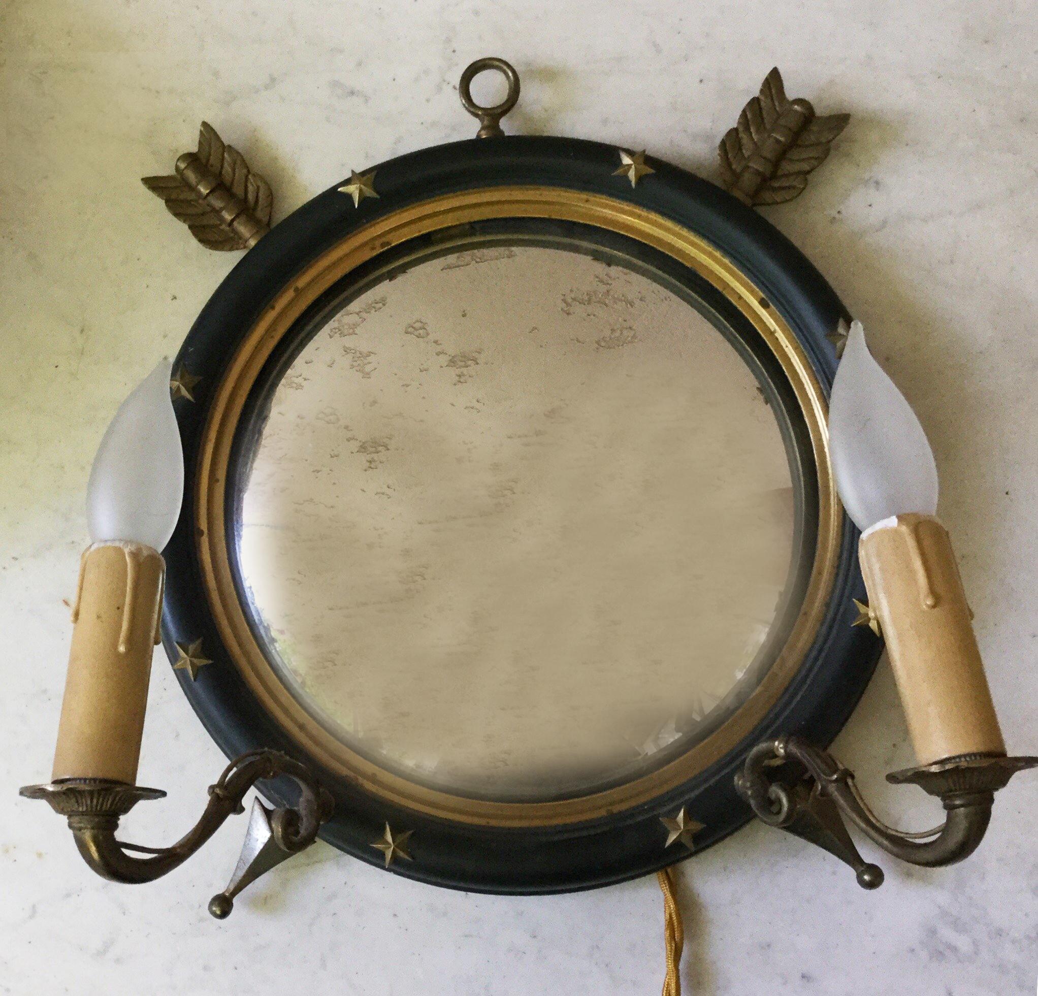 French Empire style sconce with convex mirror, two arrows, and gold stars, circa 1940. Rewired for USA with two sockets, 25W bulbs included.