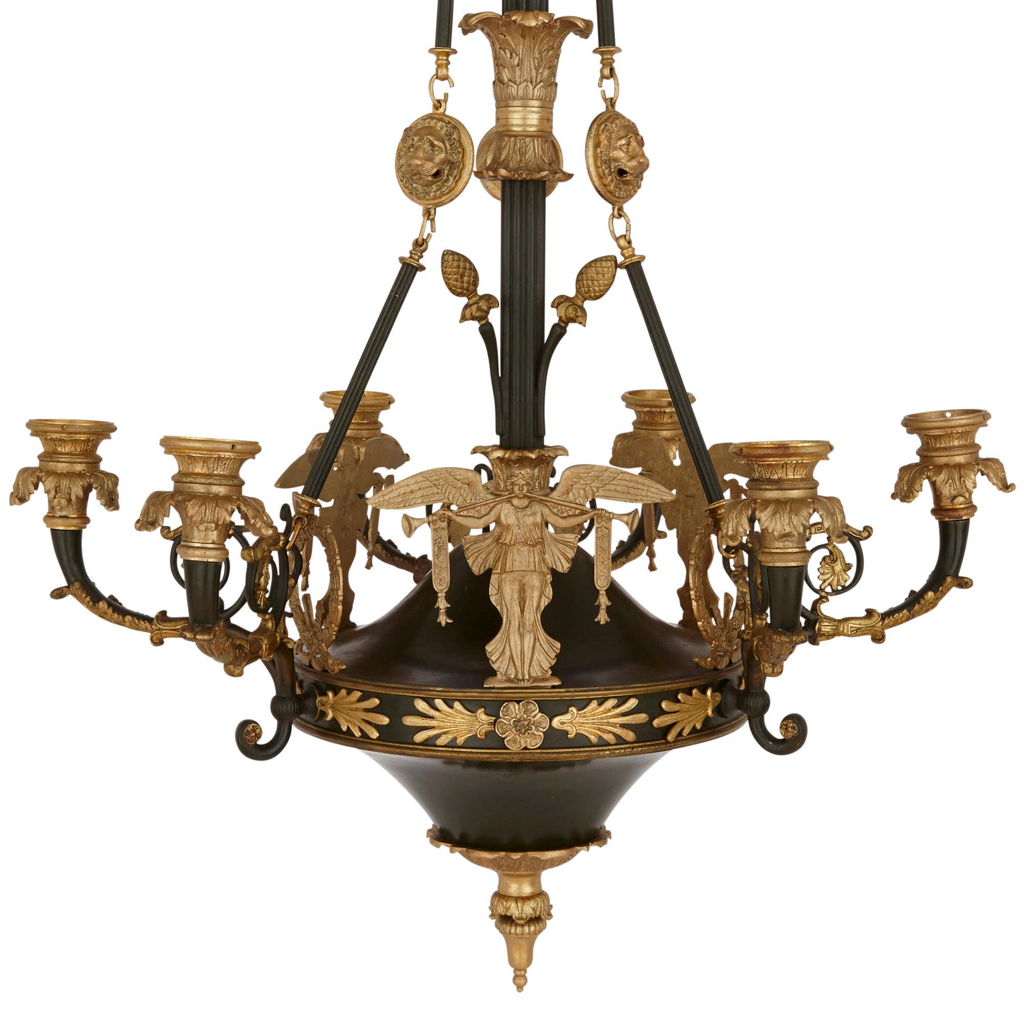 French Empire style ormolu and bronze chandelier
French, 19th century
Measures: Height 100cm, diameter 64cm

This chandelier is a beautiful example of the Empire style. The chandelier is crafted from bronze, which has been both gilt and