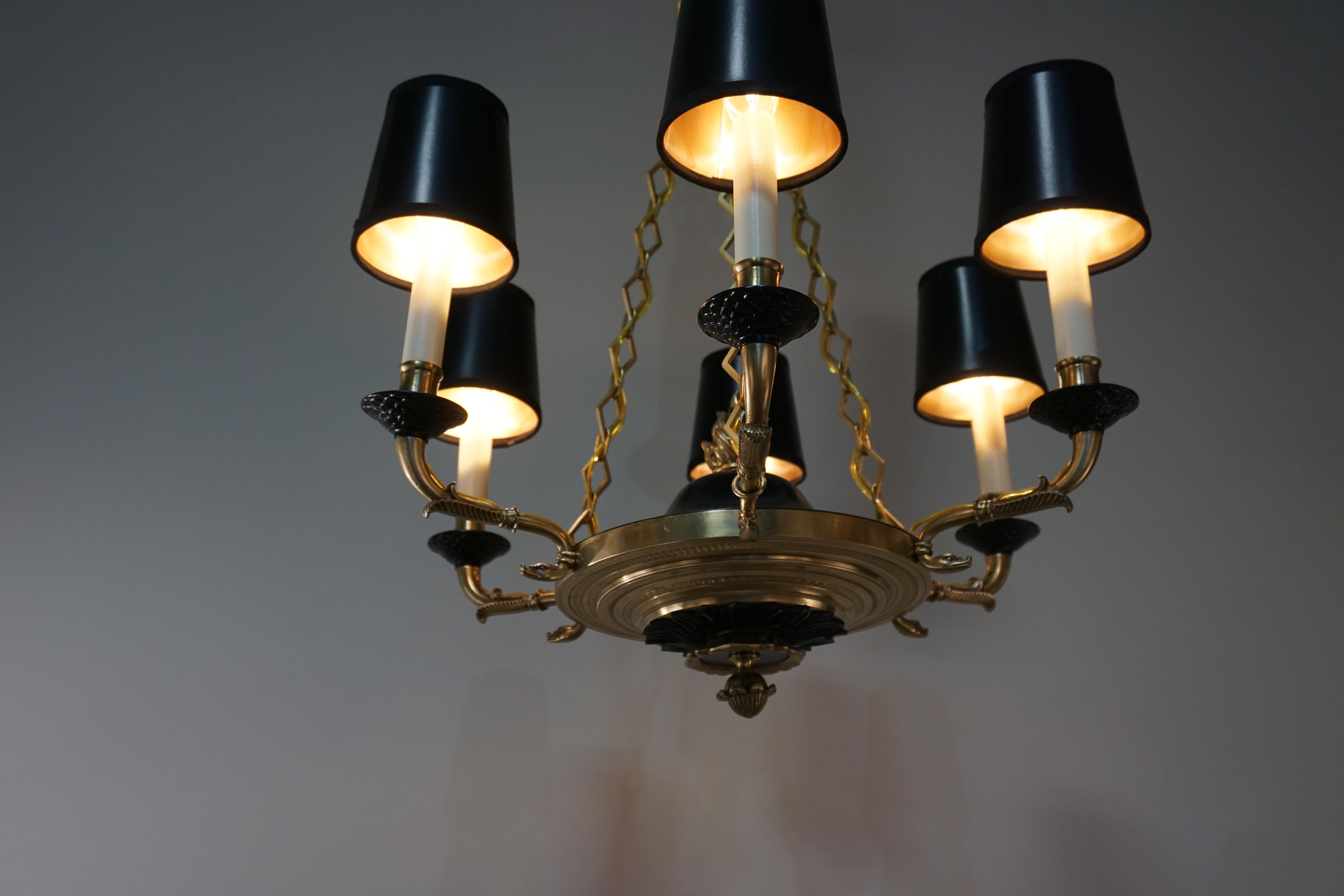 French 1920s empire style six-light bronze and black lacquer on bronze chandelier.