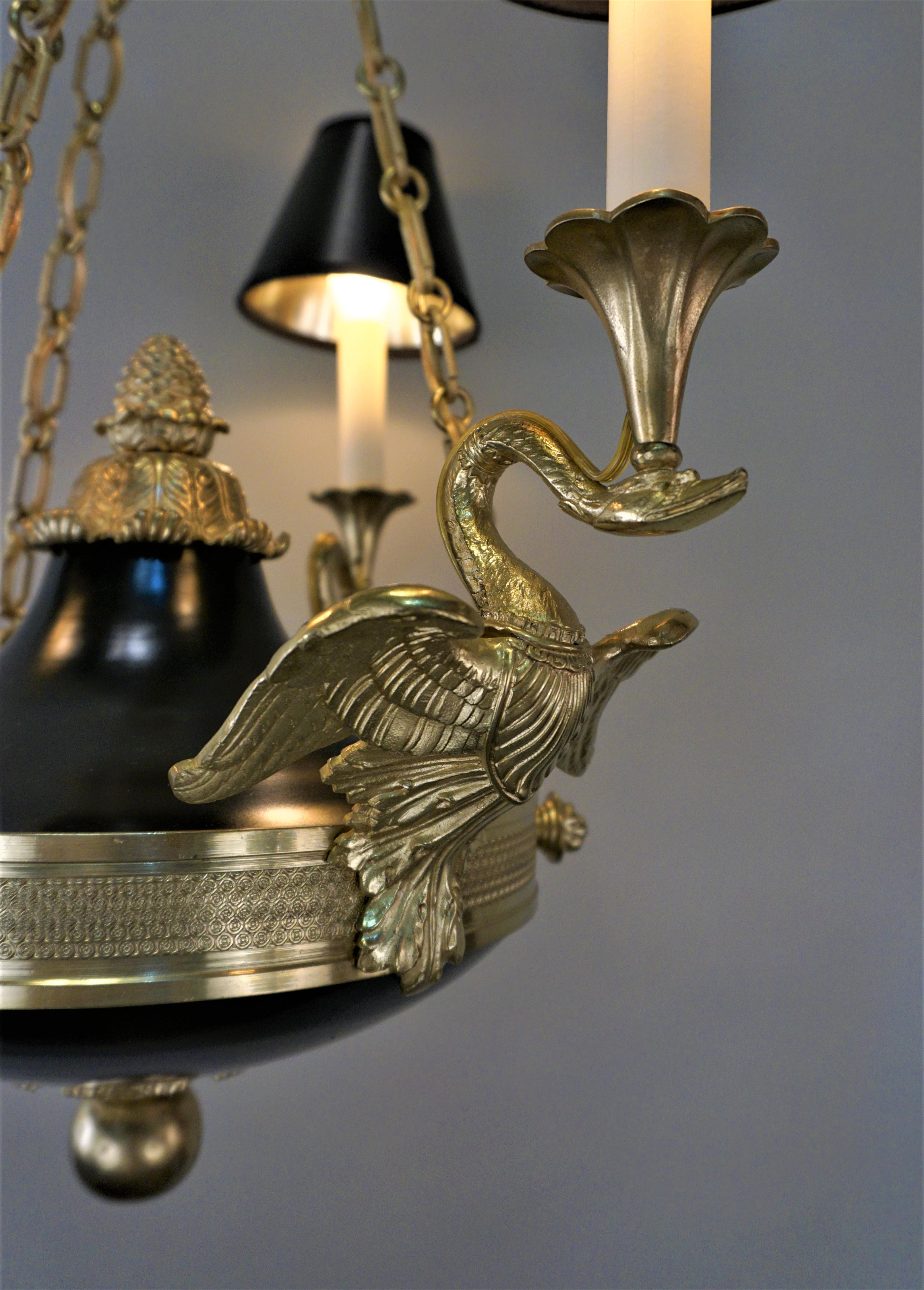 French 1920s Empire style swan arms bronze chandelier.
Height include all the chain.