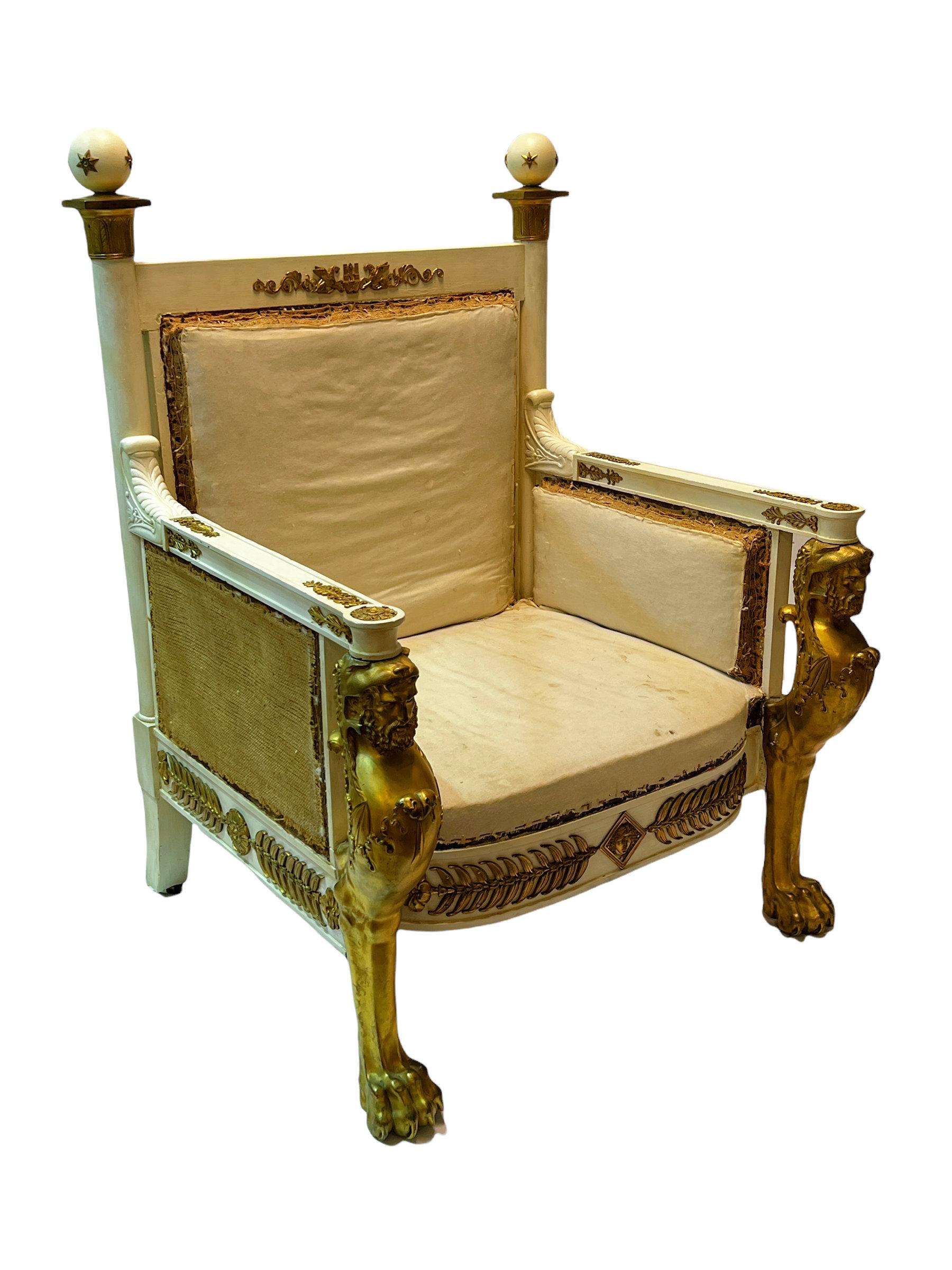 Our ormolu-mounted throne dating from the late nineteenth century is an exceptional example after the original model by Francois-Honore-Georges Jacob-Desmalter (1770-1841). Designed in the Empire style, it is decorated with ormolu bronze arm and leg