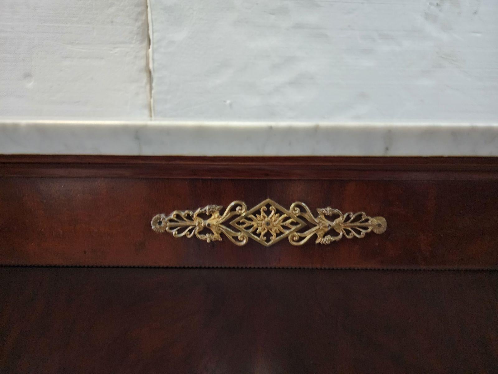 Nordiska's mahogany French Empire-style bronze-mounted marble top server