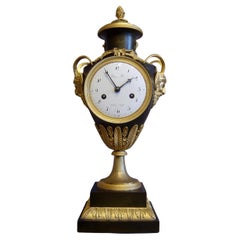 French Empire vine orientated vase clock signed Blanc Fils