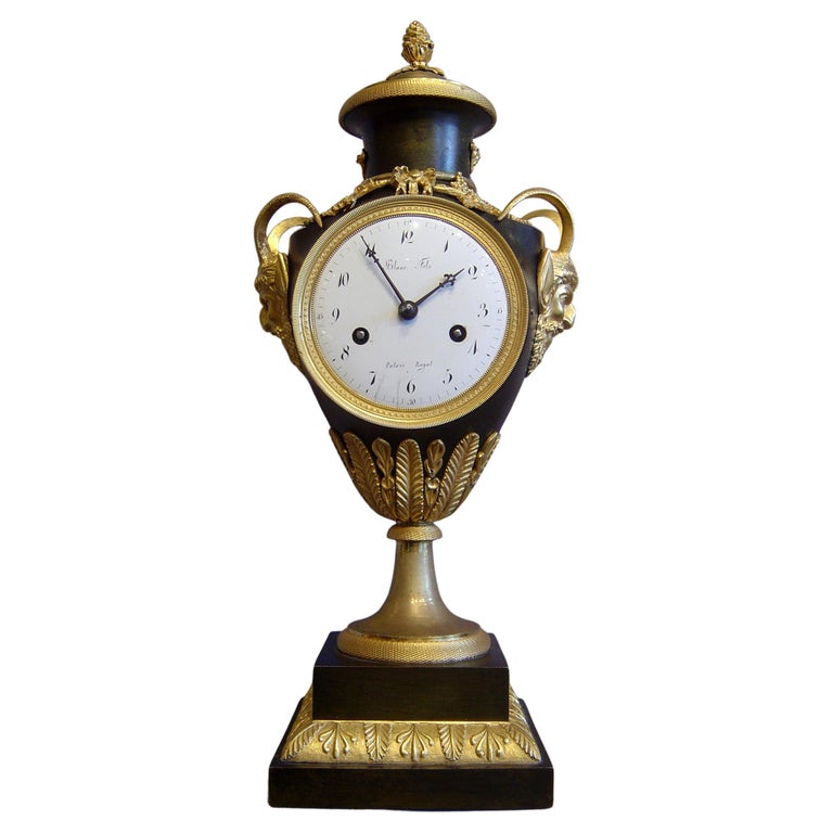 French Empire vine orientated vase clock signed Blanc Fils For Sale