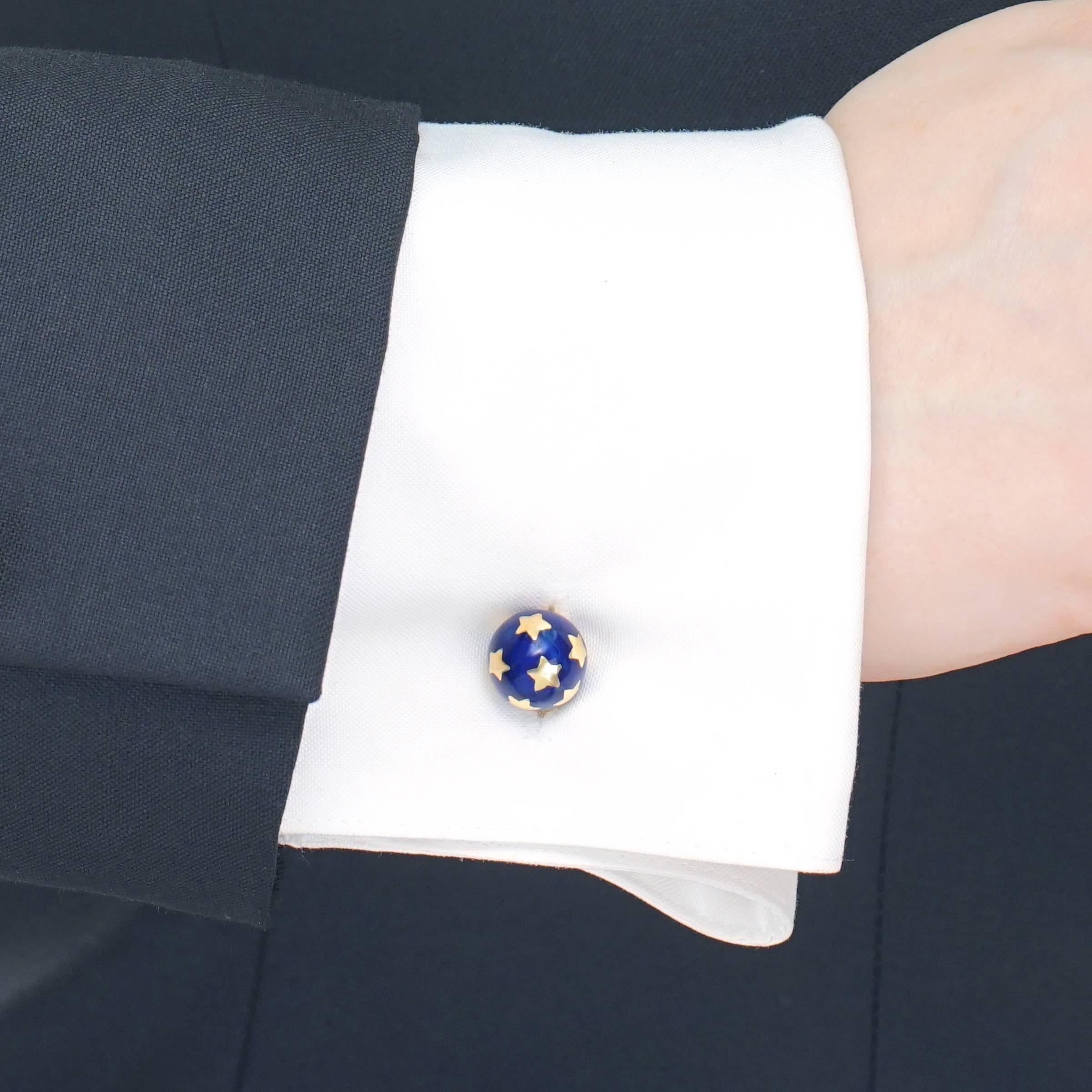 Circa 1950s, 18k, France.  From retro to modern, these 1950s accessories are the perfect go-to cuff links. Classic and modern in the same sweep of the eye, the lush enamel is a blue sky dotted with gold stars. Well made in 18k, they will add the