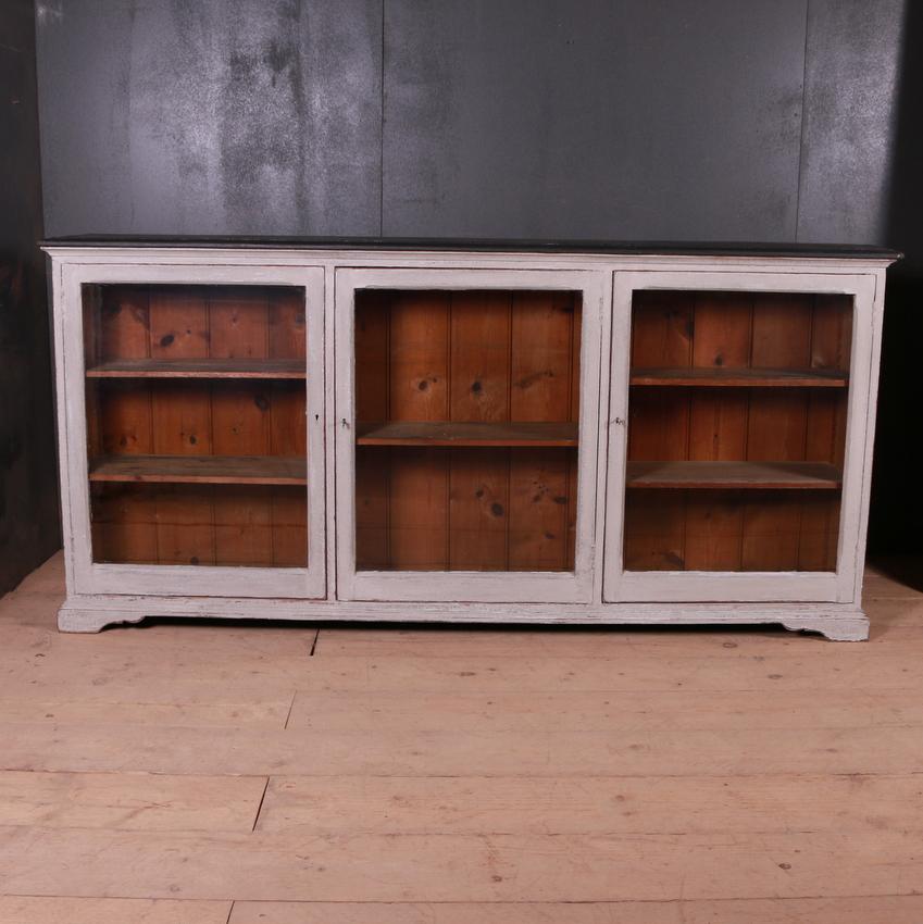 Narrow glazed French side cabinet/enfilade, 1840.

Dimensions:
81 inches (206 cms) wide
13 inches (33 cms) deep
38.5 inches (98 cms) high.

 