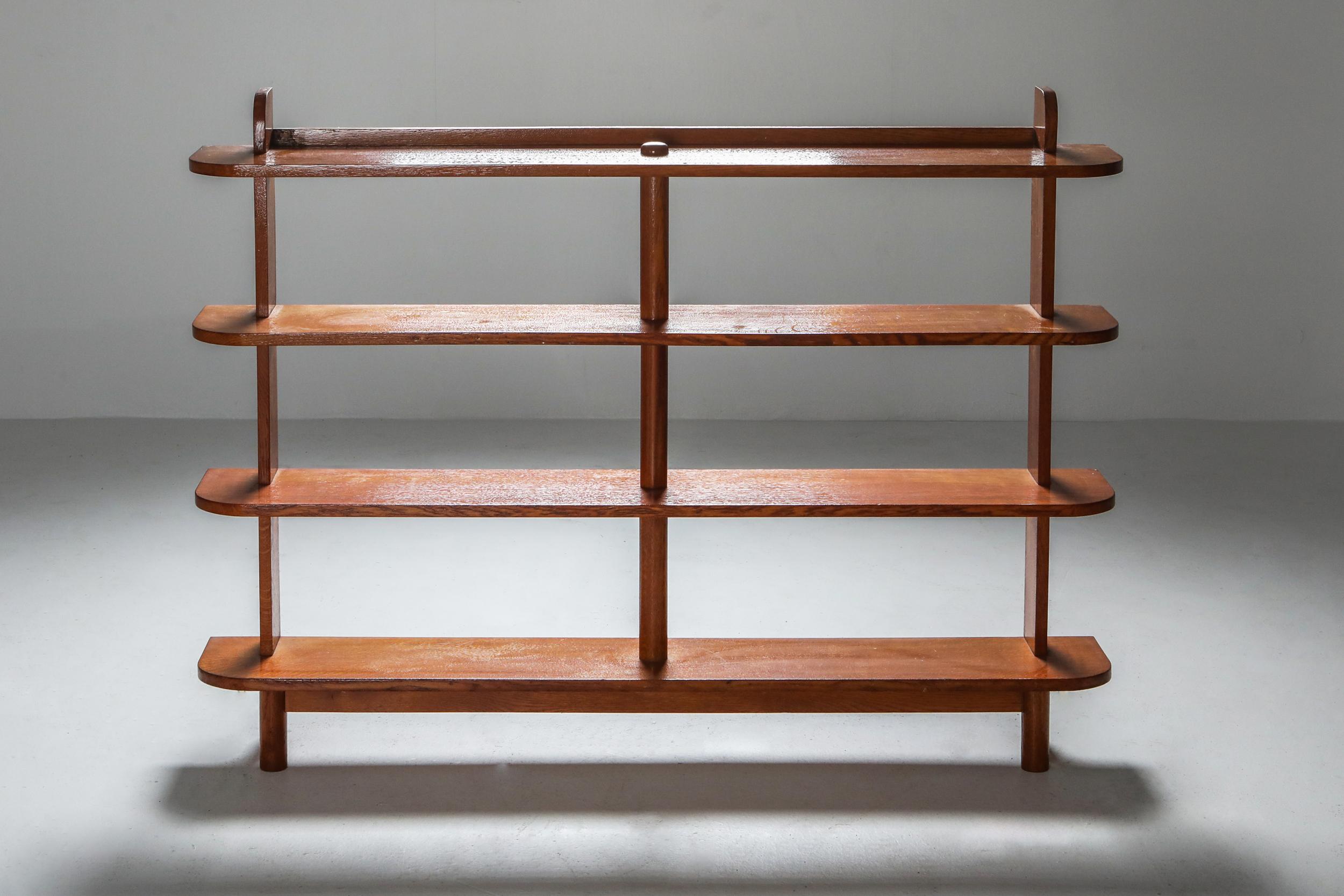 Modernist library from France, 1940s
Would fit well in a Jean Royere, Pierre Chapo inspired interior.
Made in French elm which is extinct nowadays.
Potentially a room divider.
 