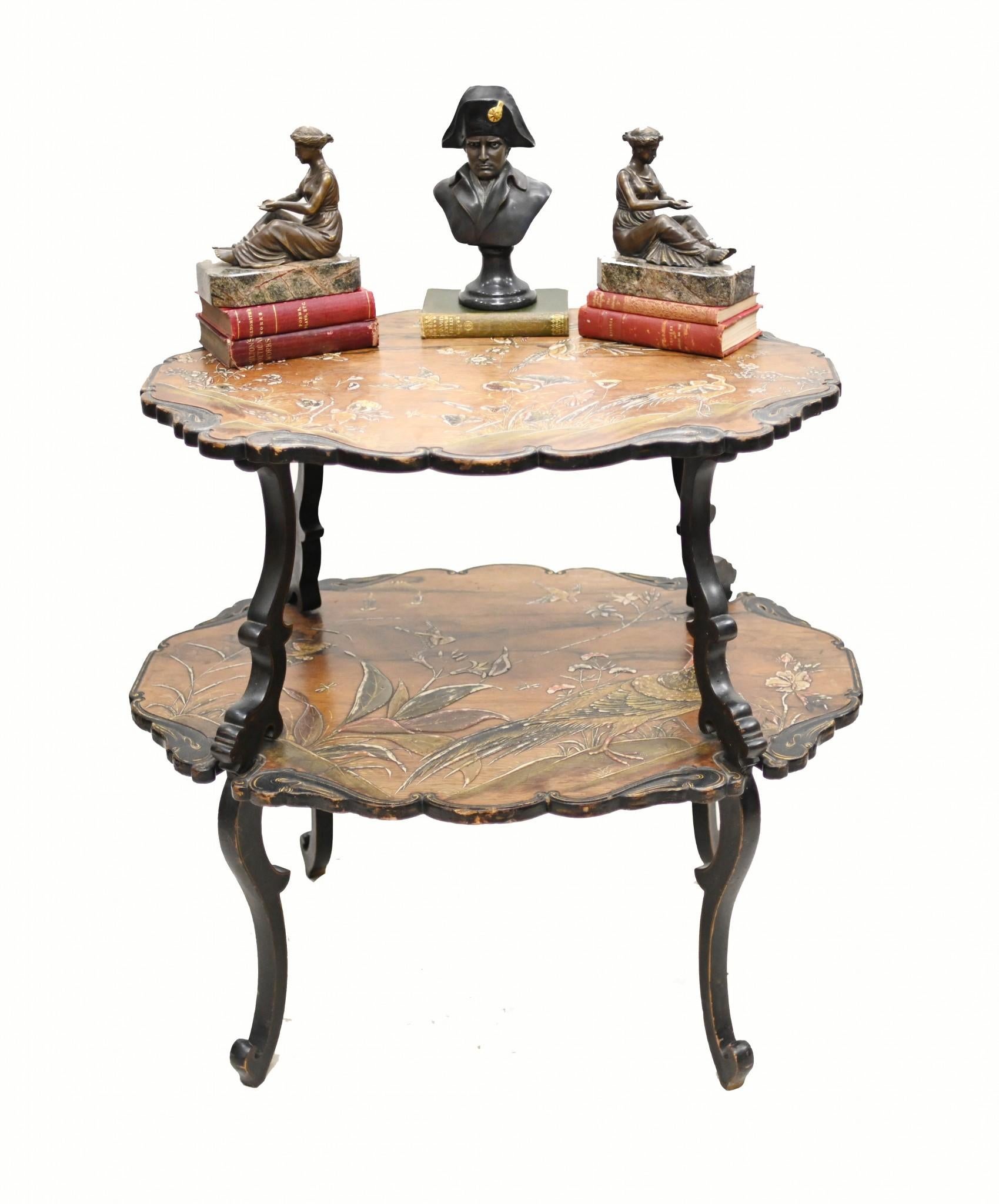 Gorgeous French two tiered etagere table with elegant Japanning
Designs include floral motifs and Japanese birds to great affect
The Japanning is very detailed and intricate and is raised - relief - in places
We date this piece to circa 1890 and it