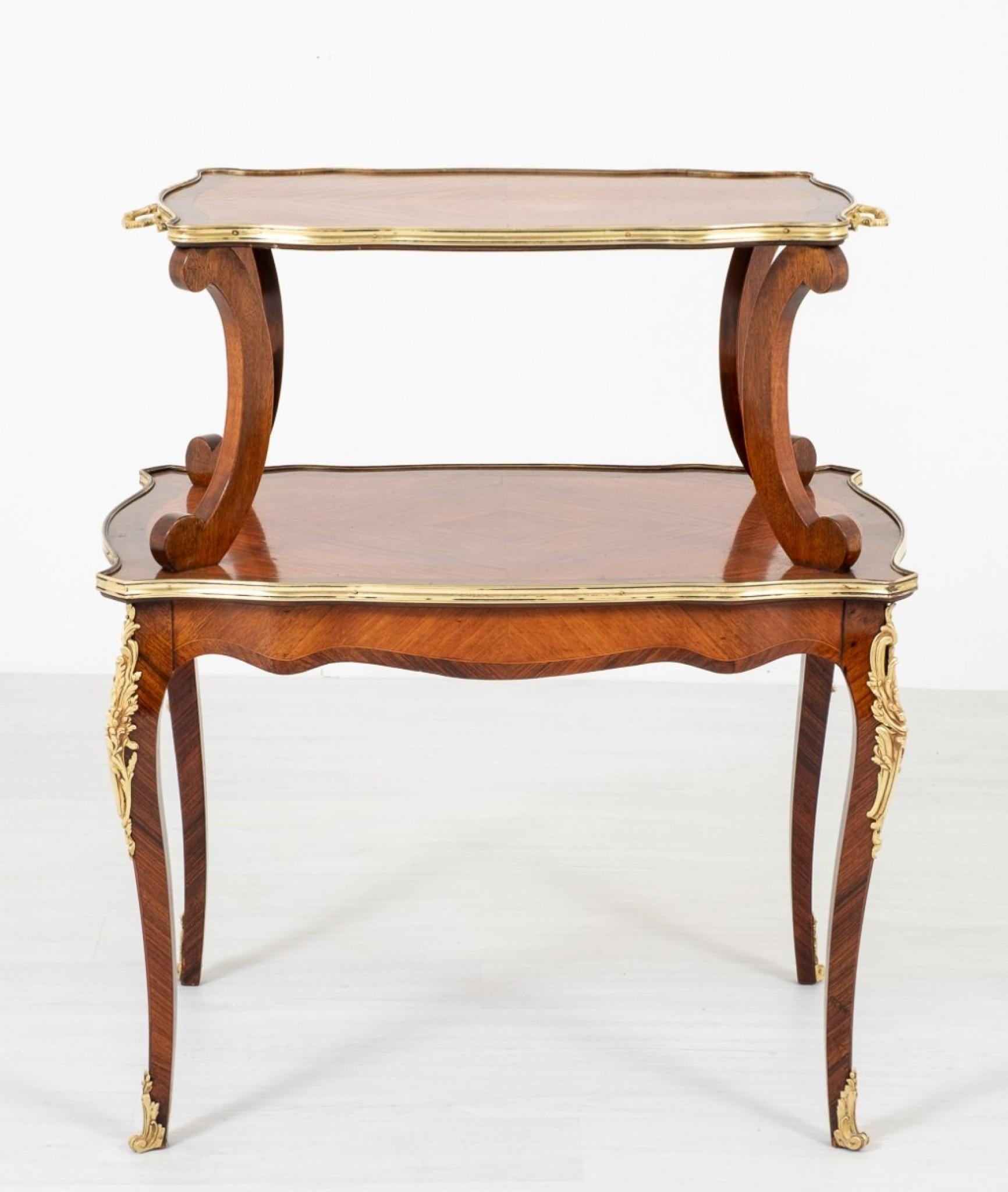 Elegant Satinwood and Ormolu Mounted Etagere.
Standing on lovely shaped legs with a shaped apron.
circa 1880
The top Tray having 4 elegant shaped supports
Featuring fine Ormolu Mounts to the Knees, Mouldings and Toes.
The Etagere having Very