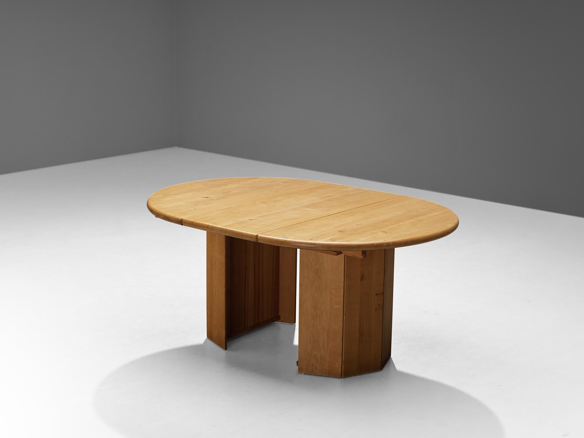 Dining table, maple, France, 1970s

Beautiful and natural dining table made in France in the 1970s. This table is executed in a very smooth and softly textured maple wood. The base of the table is made out of two half circular legs, that are