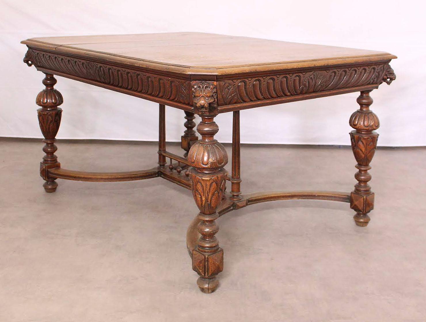 antique dining table with lion heads