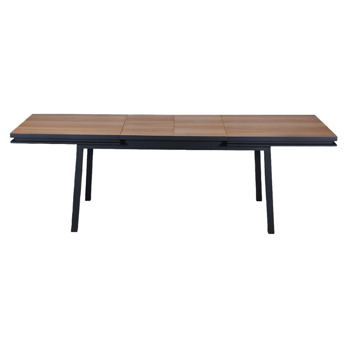 This rectangular extensible table belongs to the EGEE collection by the famous parisian Designer Eric Gizard, Paris. It is made 100% of  solid oak wood  in a scandinavian sleek design. 

2 leaves - extensions of 40 cm / 15.7'' each are folded under