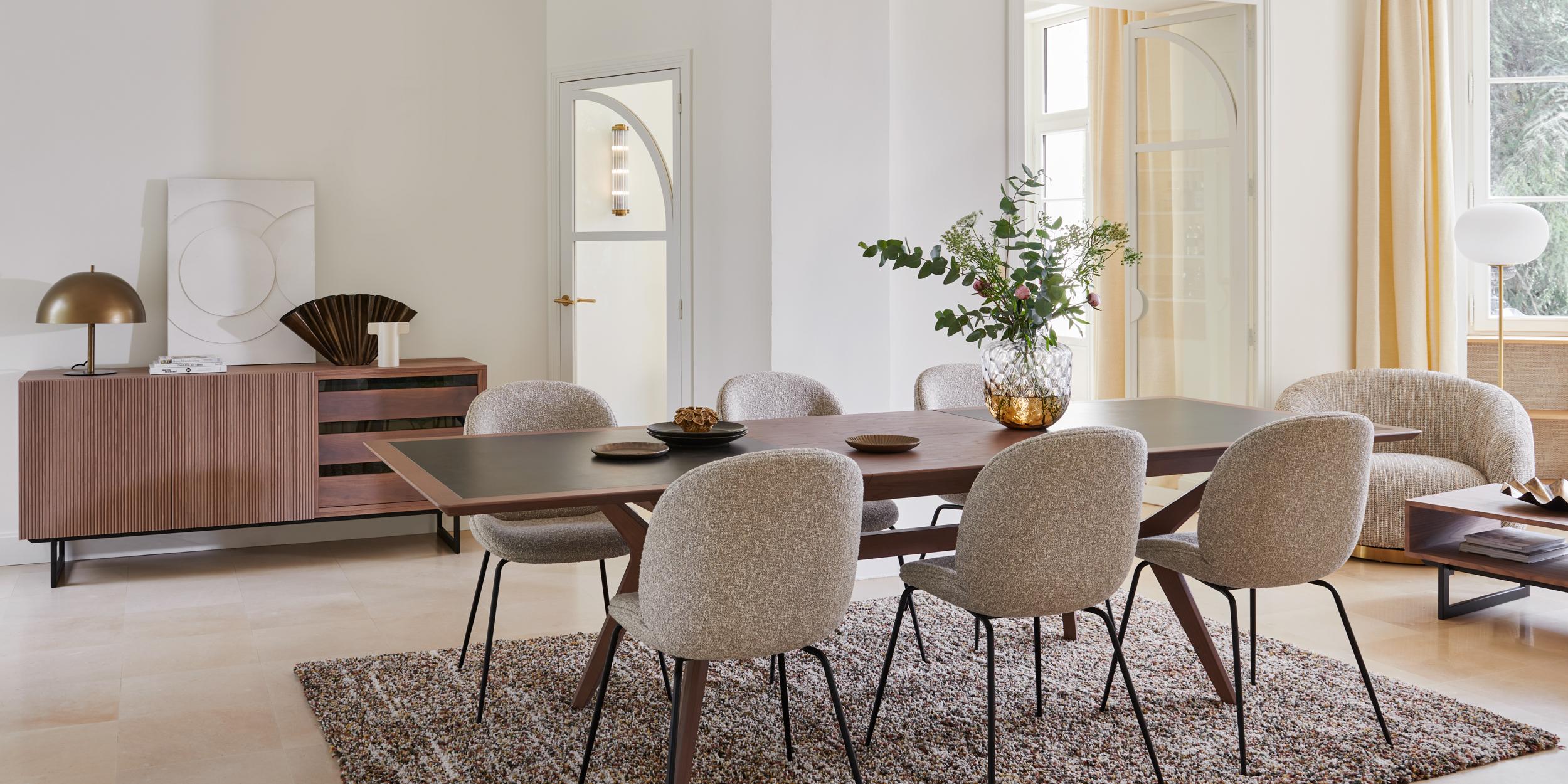 This dining table belongs to our brand new collection CANNES and is designed by Christophe Lecomte, a French designer located on the French Atlantic shore. 
Christophe graduated from the notorious BOULLE school in 1990 and began his career in