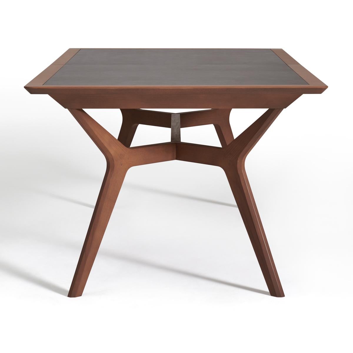 Woodwork French extendable dining table, walnut stained & ceramic top, design C. Lecomte For Sale