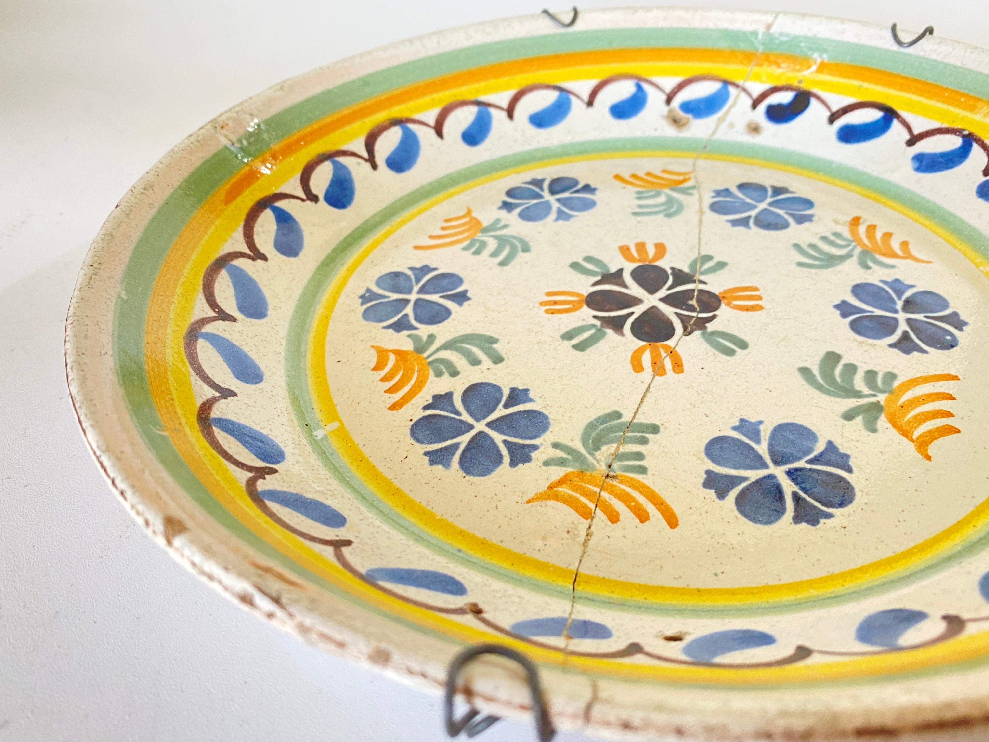 Small Plate in Faience. It has been made in France in the 18th century. It is hand painted.
With flowers pattern decoration.