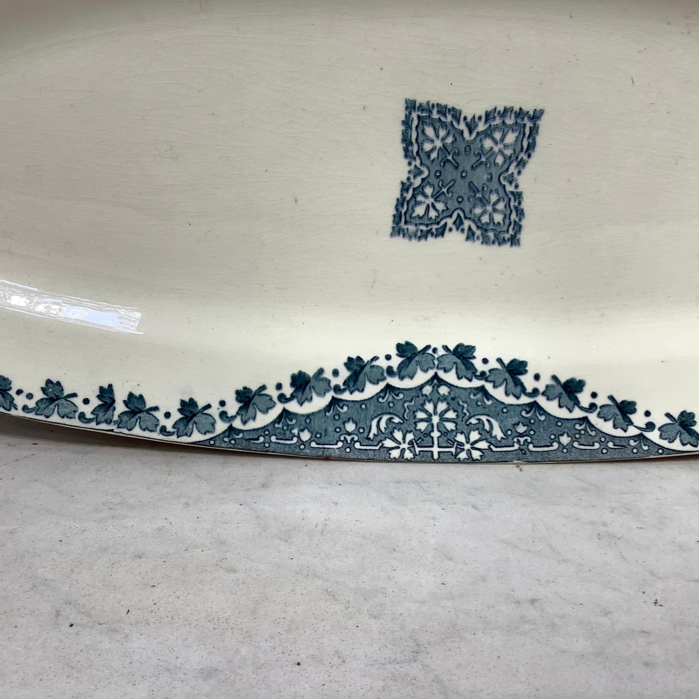 French faience blue and white fish platter signed Longwy, circa 1900.
Measures: 21.5