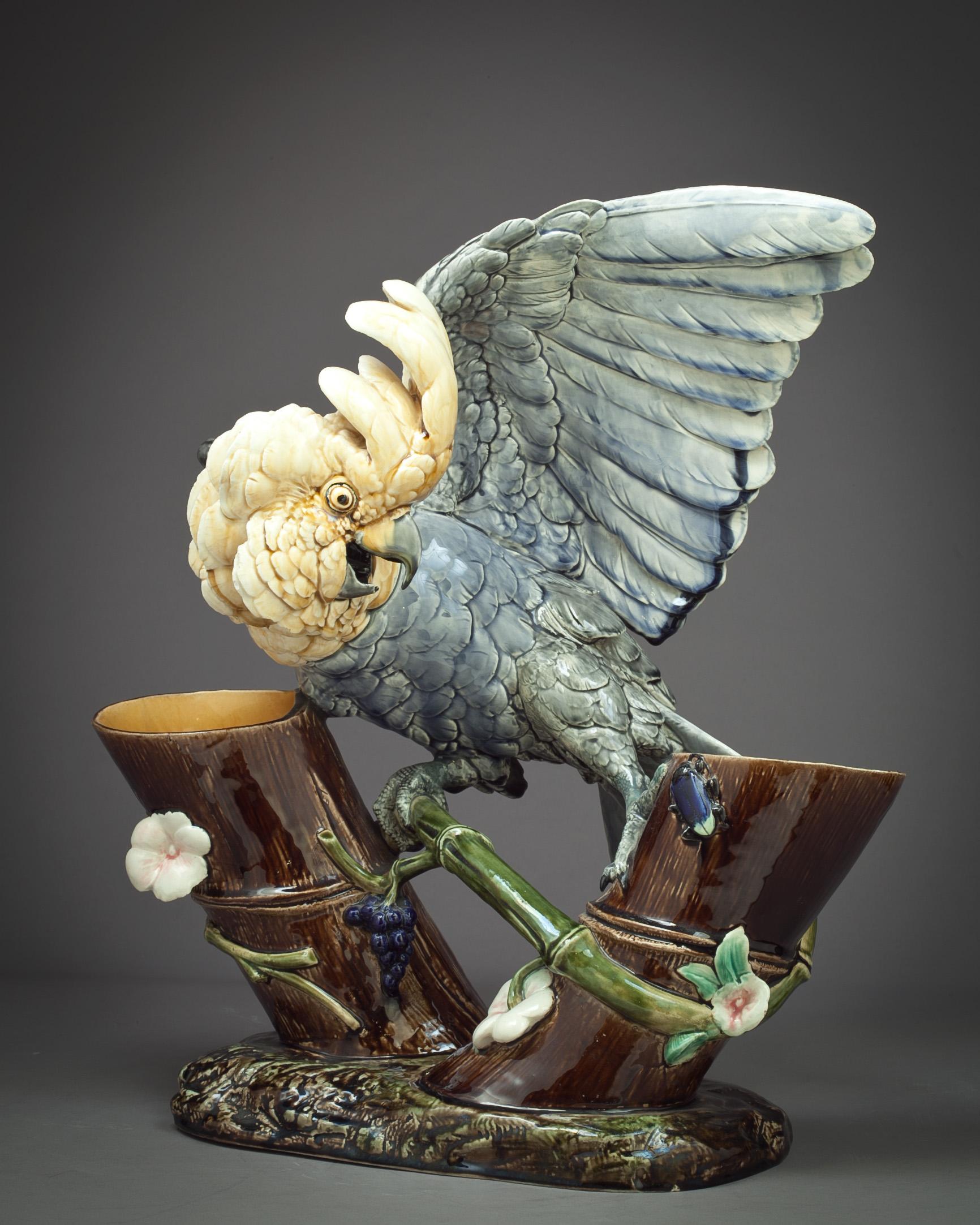 Choisy-Le-Roi Hautim Boulanger and Cie.

Probably by Paul Comolera (French 1818-1897). The bird modelled with wings outstretched, perched between two open bamboo stems, black printed factory mark, impressed shape number 879.