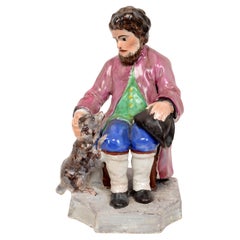 French Faience Earthenware Seated Figure From Les Islettes Factory, Early 19th c