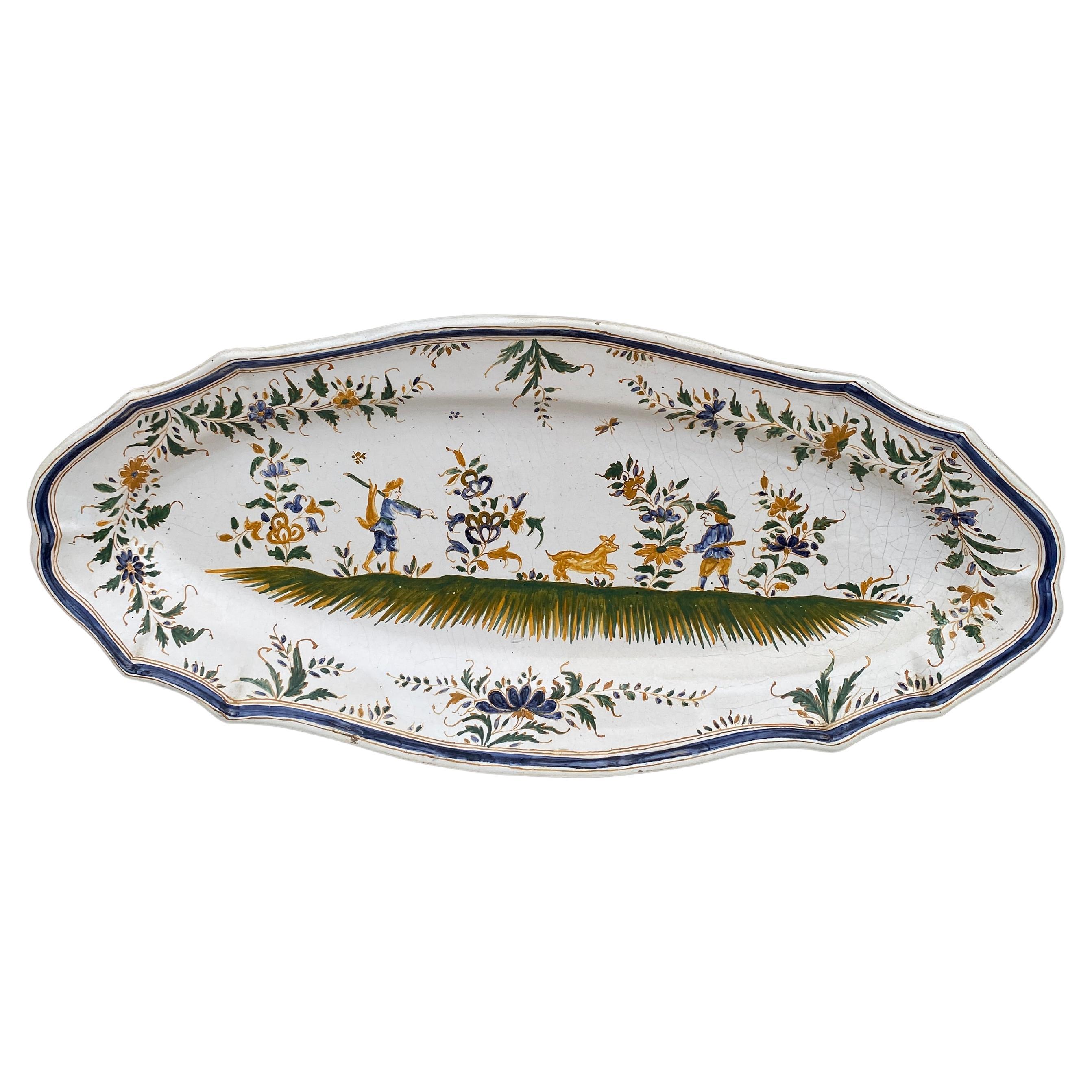 French Faience Fish Platter Moustiers Style Circa 1950.
Manufacture of Martres Tolosane.
Hunting scene.