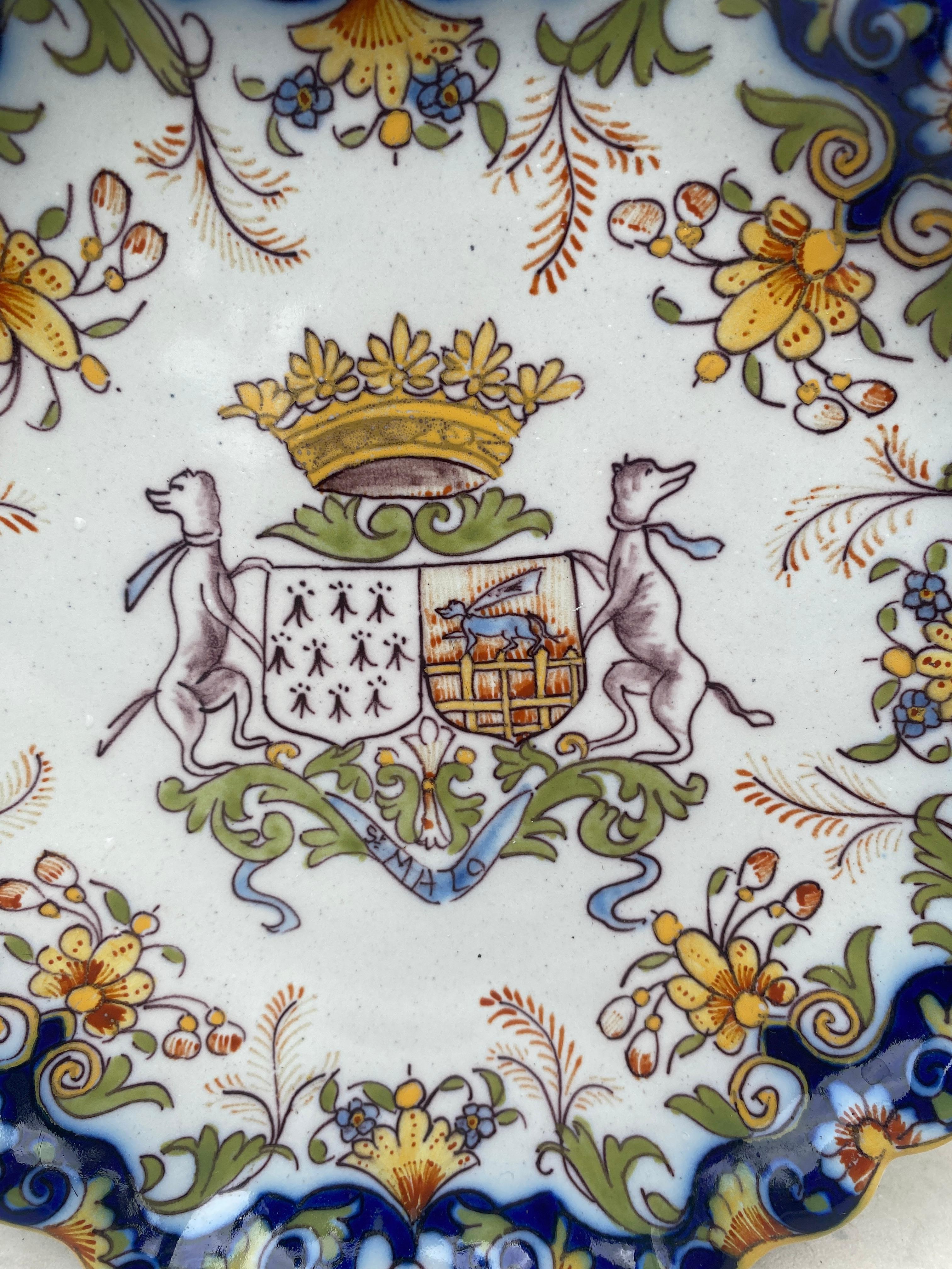 Antique French faience handled platter with coat of arms dogs and floral pattern, circa 1900. 