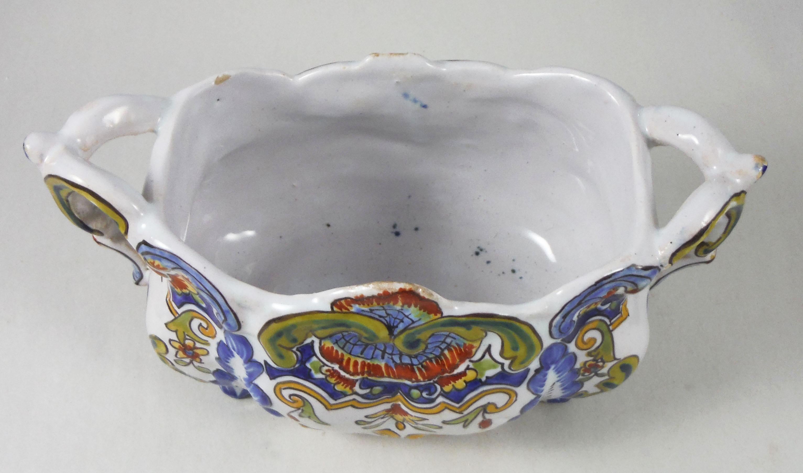 French Desvres faience jardinière painted with flowers, circa 1900. Marked on base.
Minor wear.