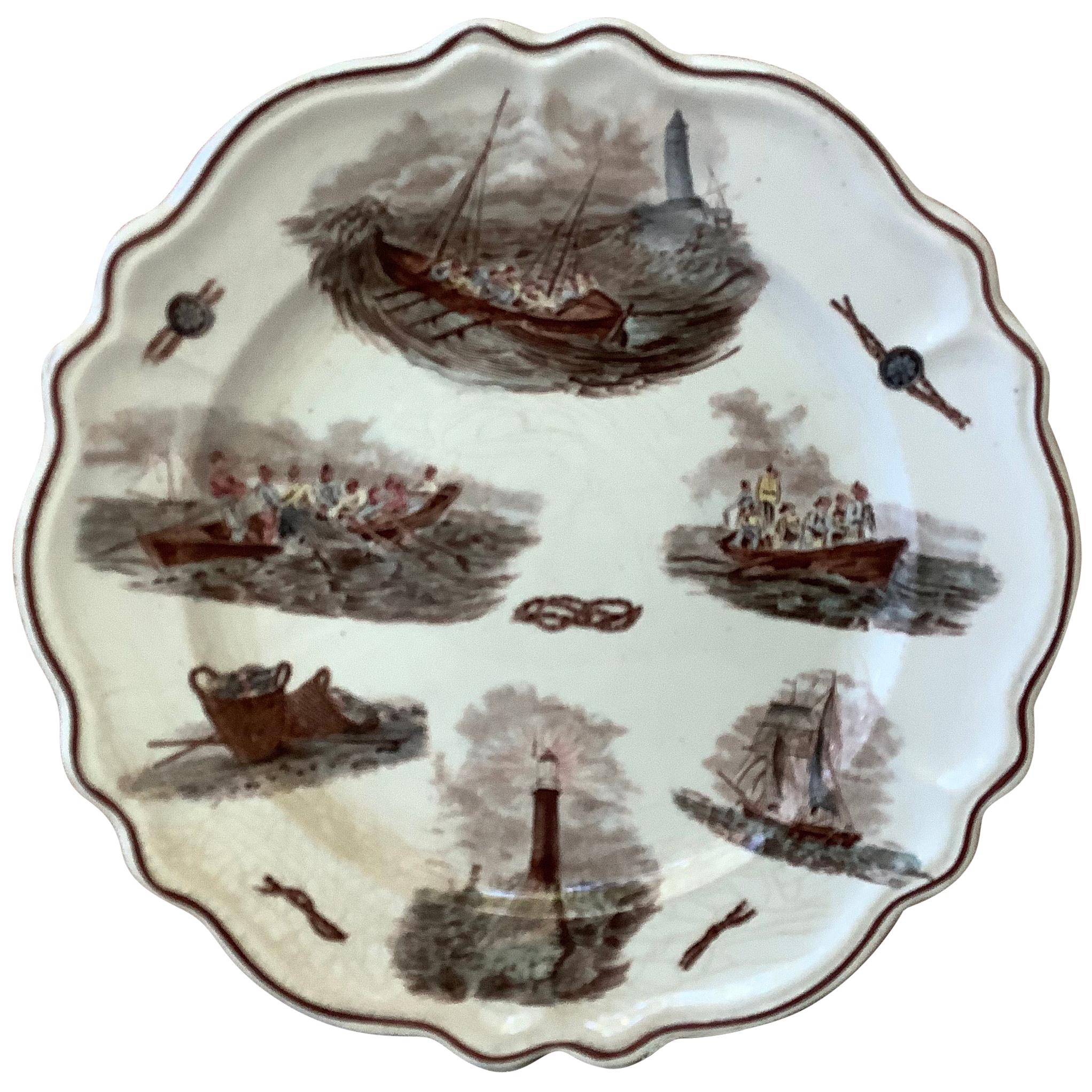 Assiette à motifs nautiques en faïence française, vers 1900