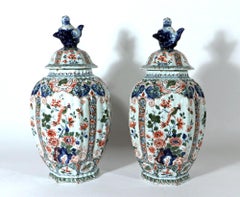 French Faience Octagonal Fluted Bird Decorated Vases and covers , Geo Martel