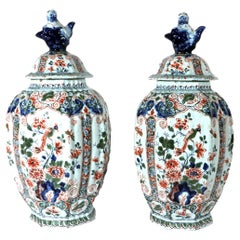 French Faience Octagonal Fluted Bird Decorated Vases and covers , Geo Martel