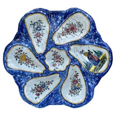 Piatto per ostriche in maiolica francese del 1920 circa
