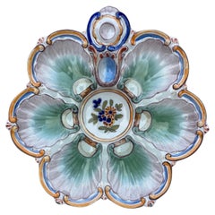 Assiette à huîtres en faïence française Saint-Clément, vers 1890