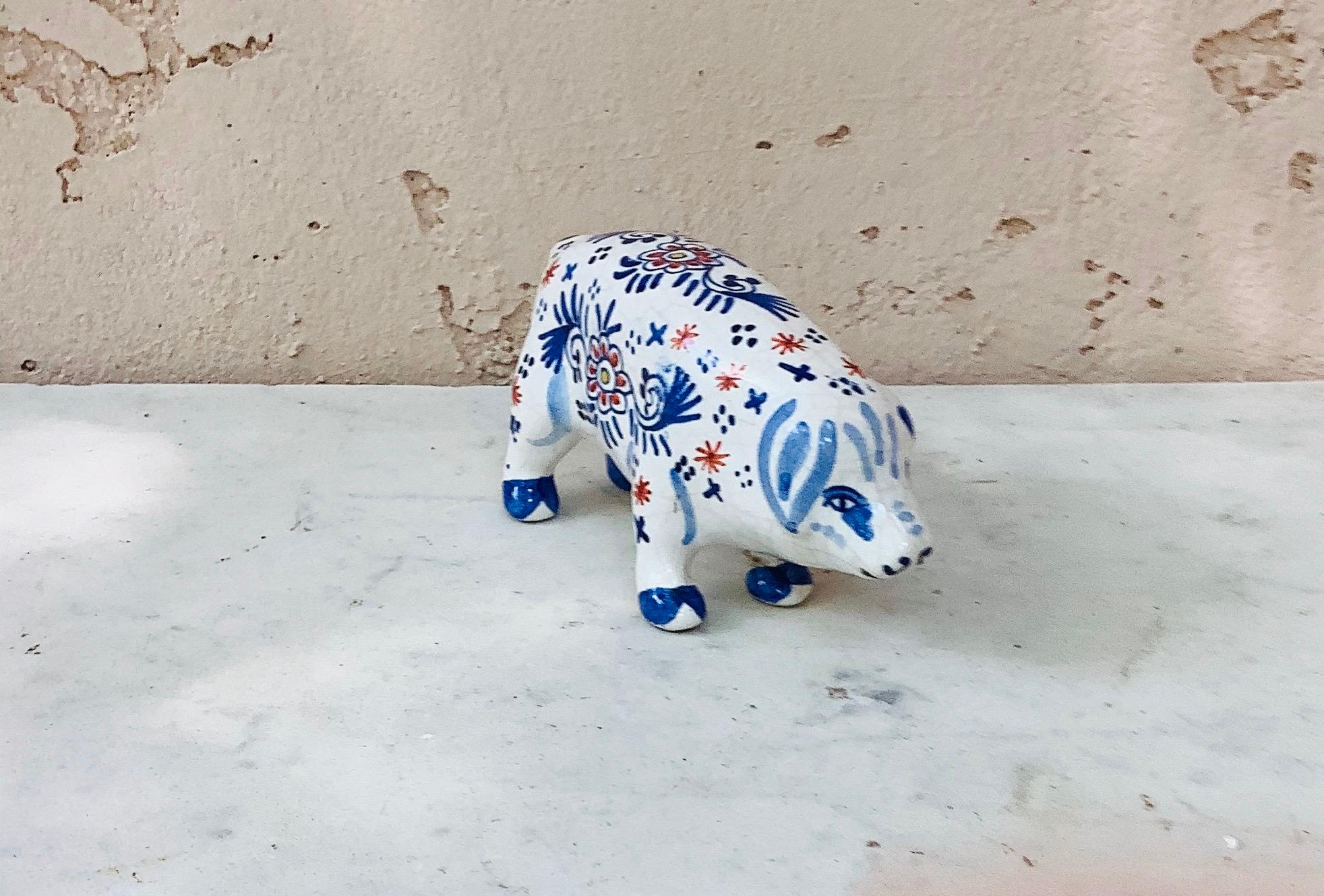 French faience blue and white pig attributed to Desvres, circa 1910.
 