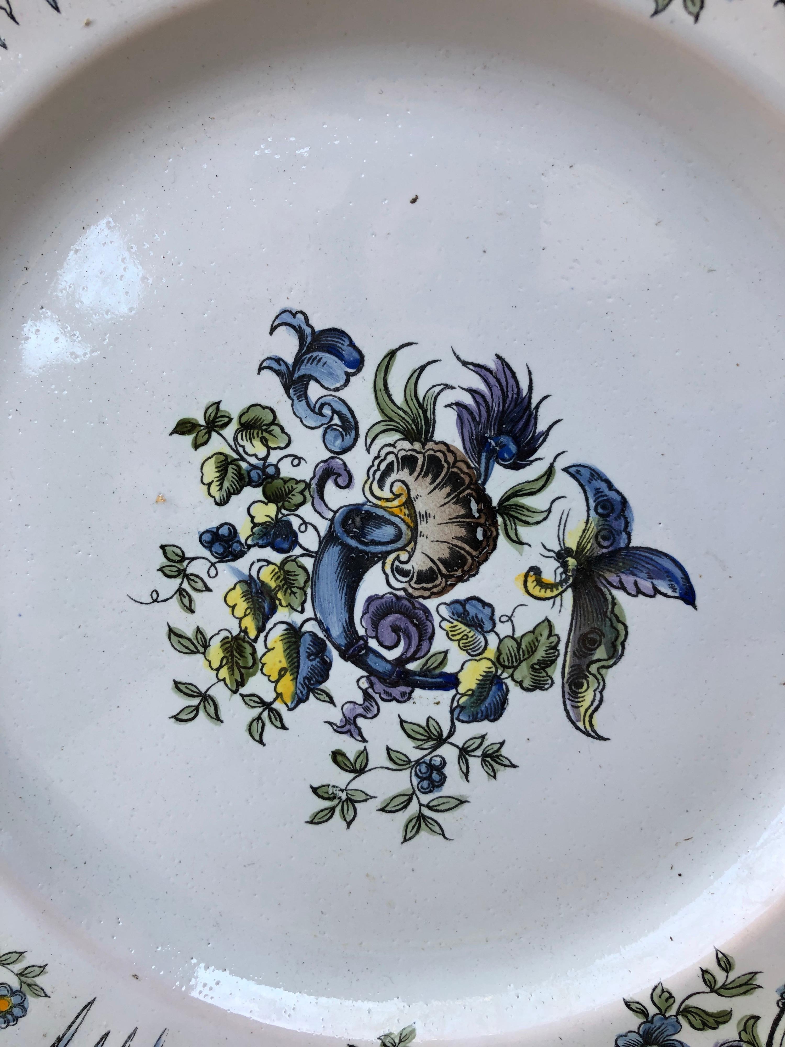 French Faience plate signed Emile Galle Saint Clement Circa 1900.
Decorated with cornucopia and flowers, butterfly.
